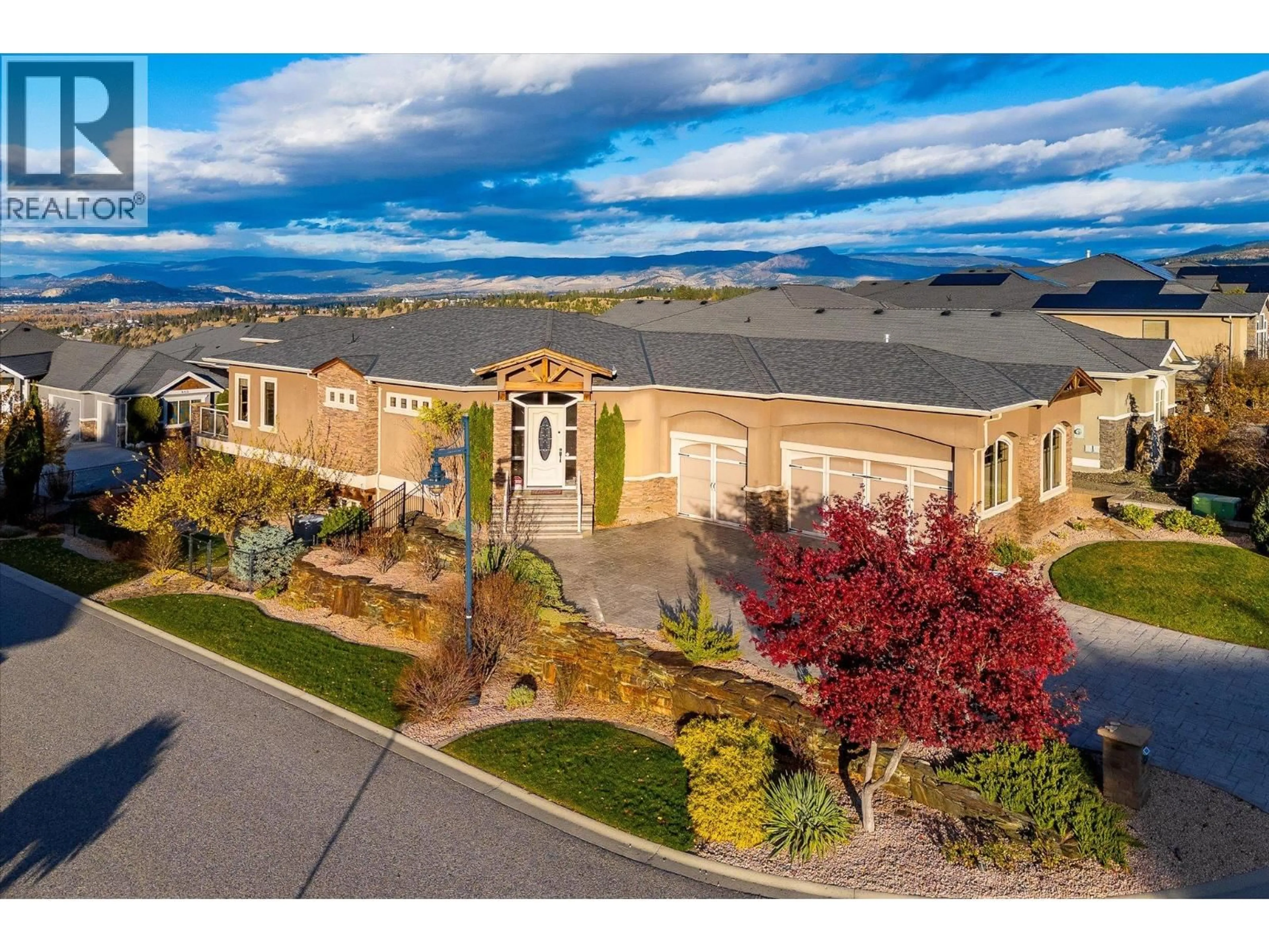 A pic from outside/outdoor area/front of a property/back of a property/a pic from drone, mountain view for 603 ARBOR VIEW DRIVE, Kelowna British Columbia V1W4Z7