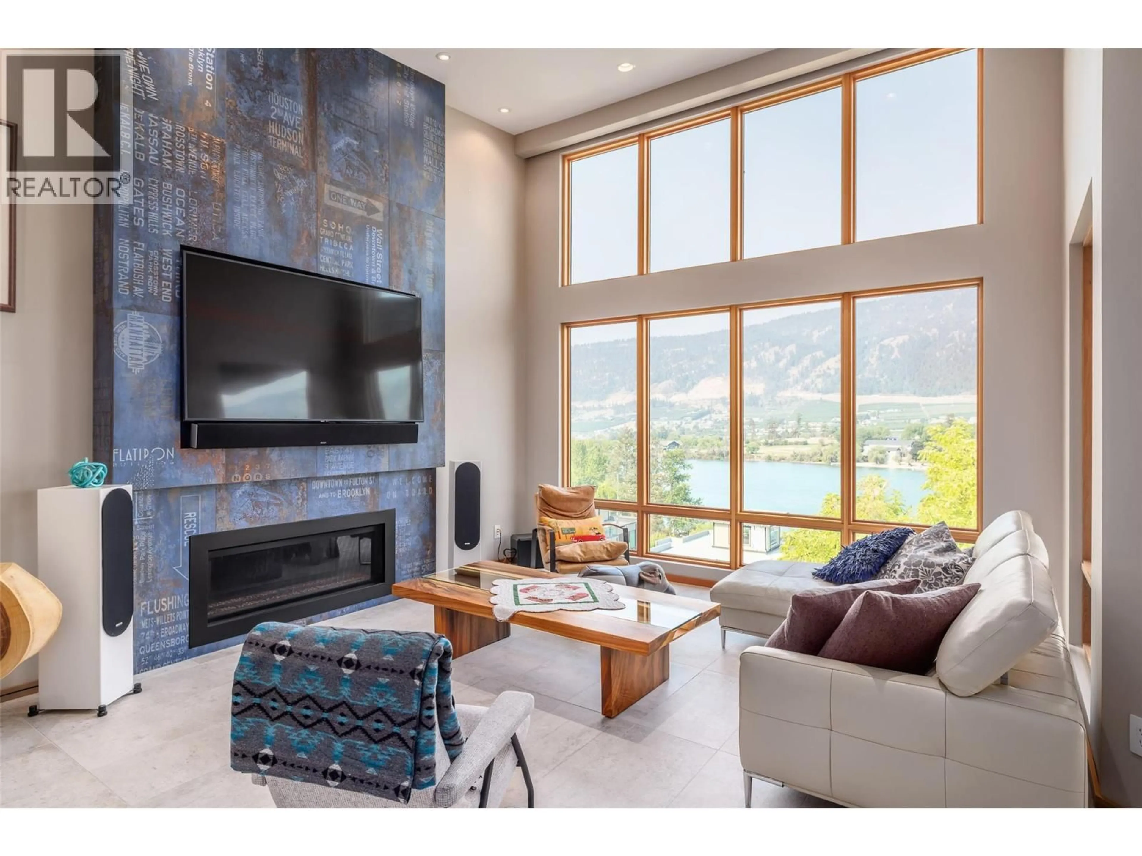 Living room with furniture, unknown for 15896 CLARIDGE DRIVE, Lake Country British Columbia V4V2T6