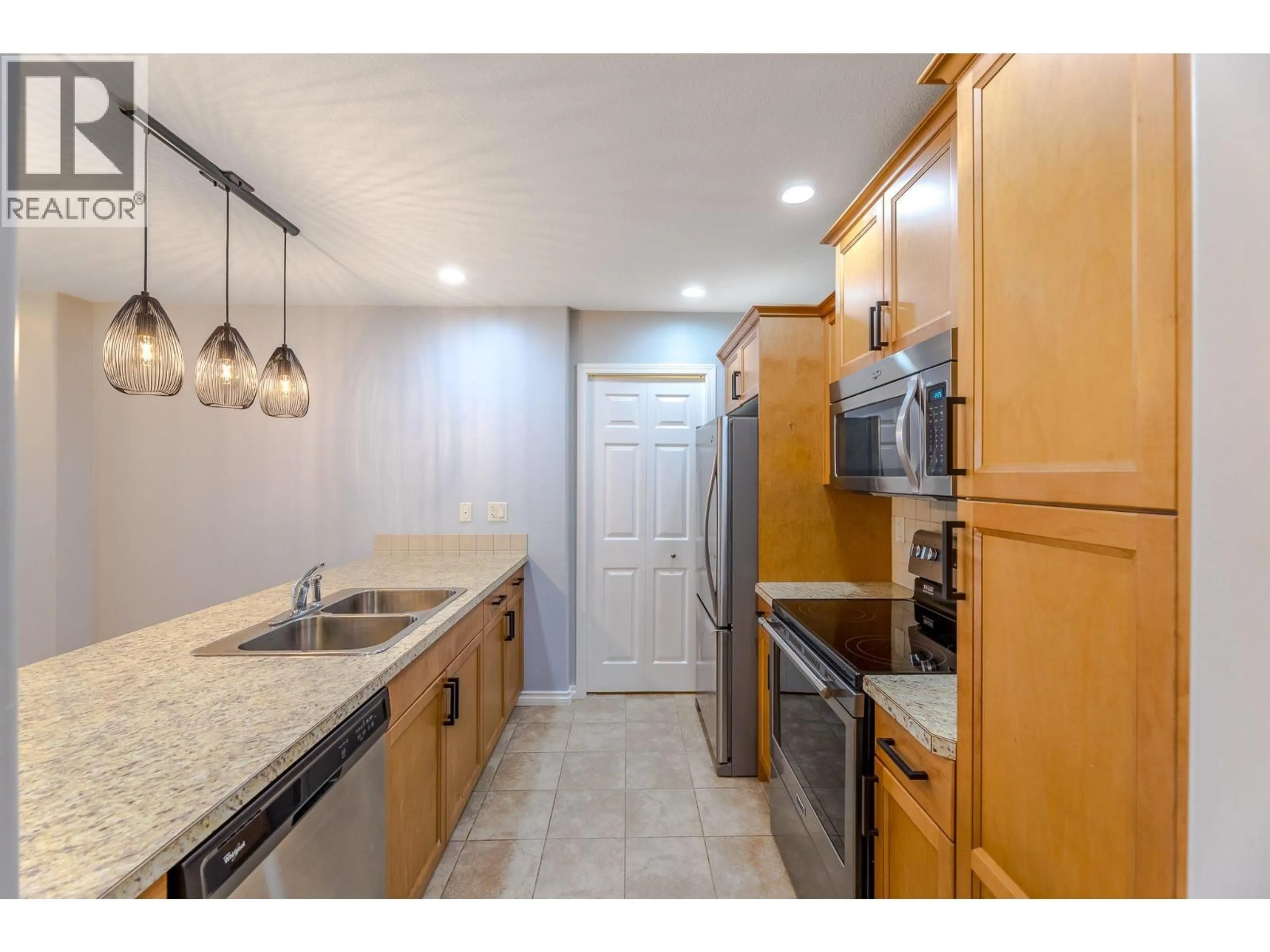 Standard kitchen, ceramic/tile floor for 704 - 2125 ATKINSON STREET, Penticton British Columbia V2A9E6