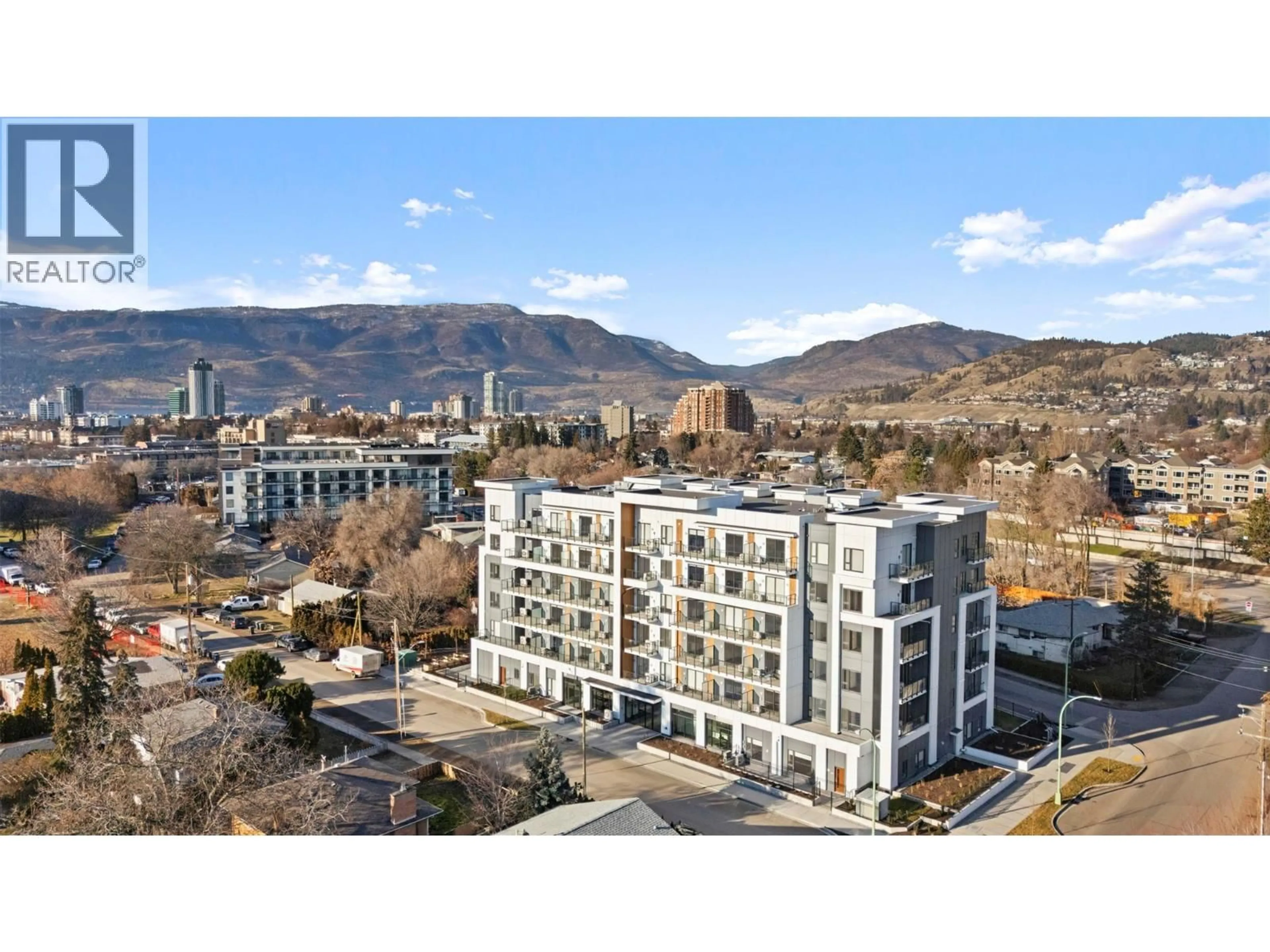 A pic from outside/outdoor area/front of a property/back of a property/a pic from drone, mountain view for 212 - 1380 PRIDHAM AVENUE, Kelowna British Columbia V1Y6B9
