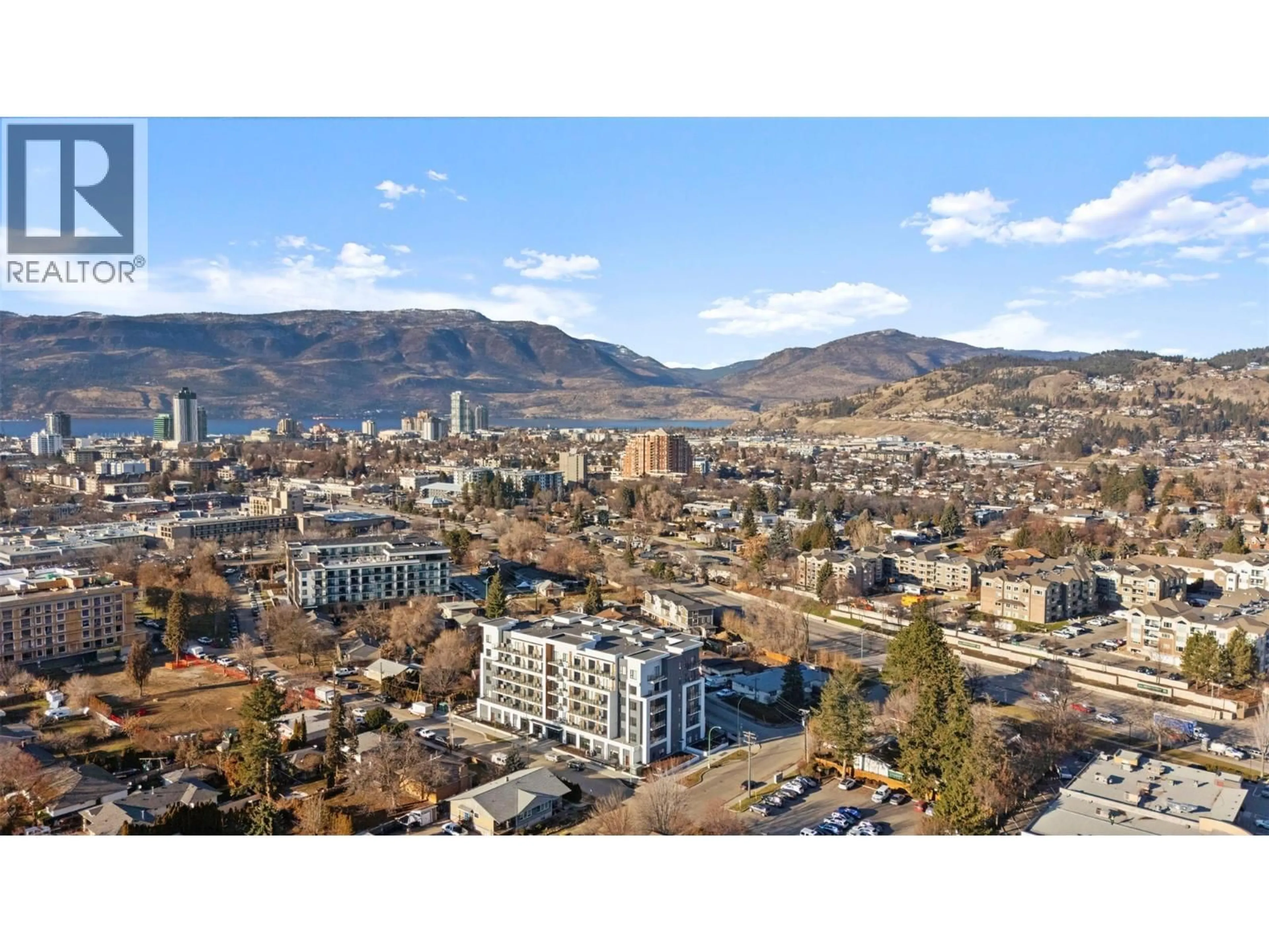 A pic from outside/outdoor area/front of a property/back of a property/a pic from drone, mountain view for 212 - 1380 PRIDHAM AVENUE, Kelowna British Columbia V1Y6B9