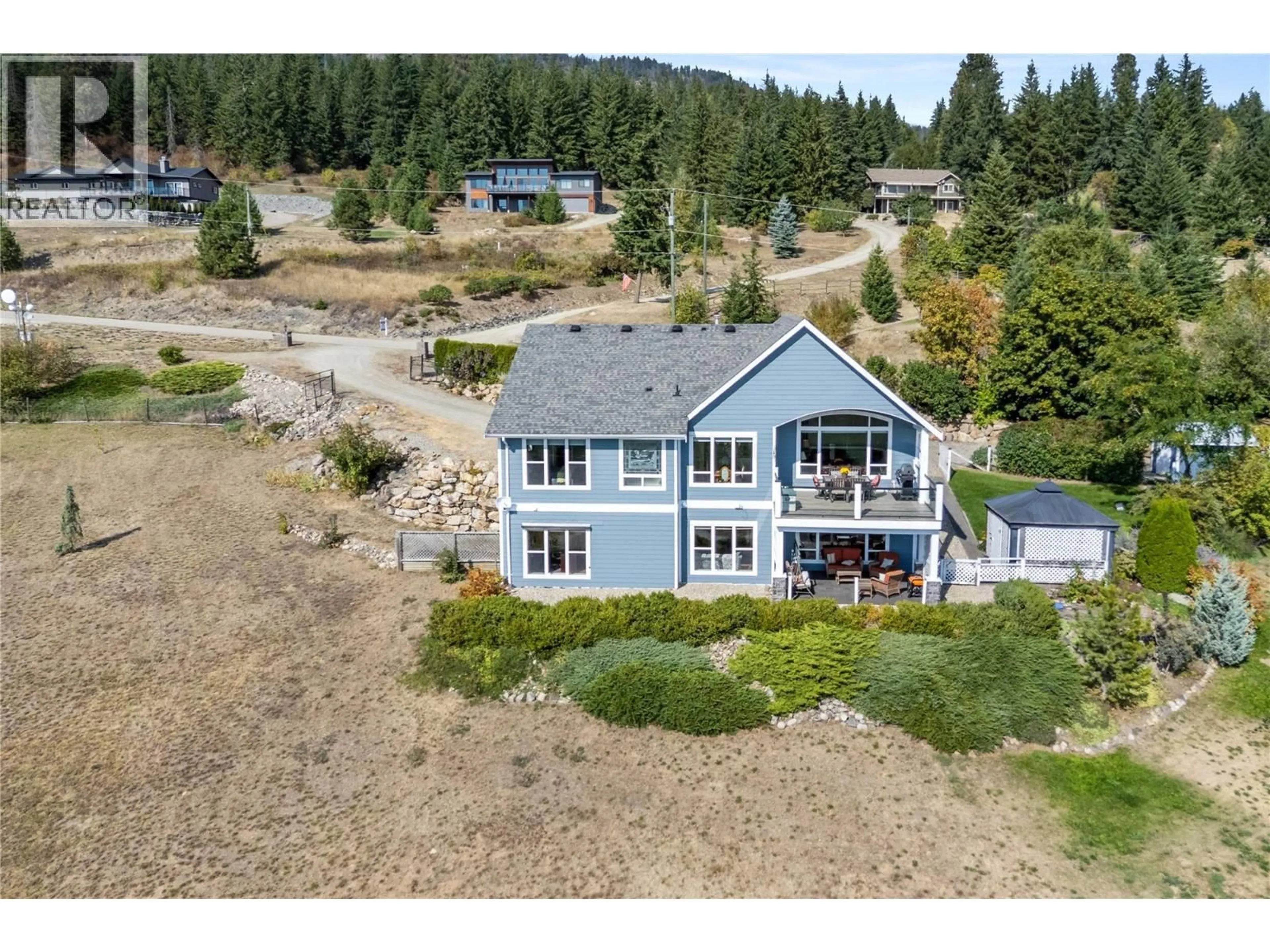 A pic from outside/outdoor area/front of a property/back of a property/a pic from drone, water/lake/river/ocean view for 2754 SUN RIDGE PLACE, Tappen British Columbia V0E2X0