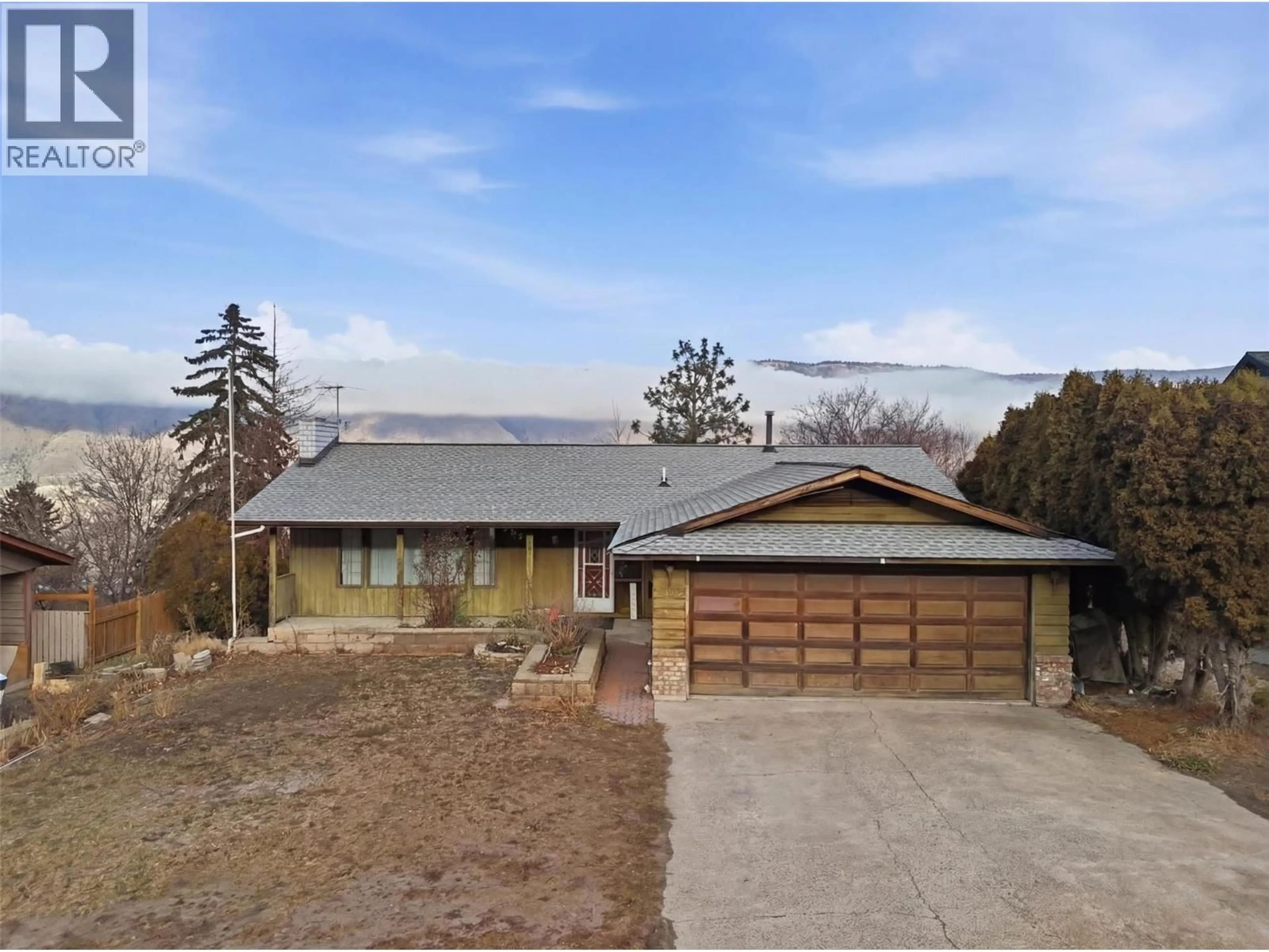 A pic from outside/outdoor area/front of a property/back of a property/a pic from drone, street for 2434 QU'APPELLE BOULEVARD, Kamloops British Columbia V2E1T4