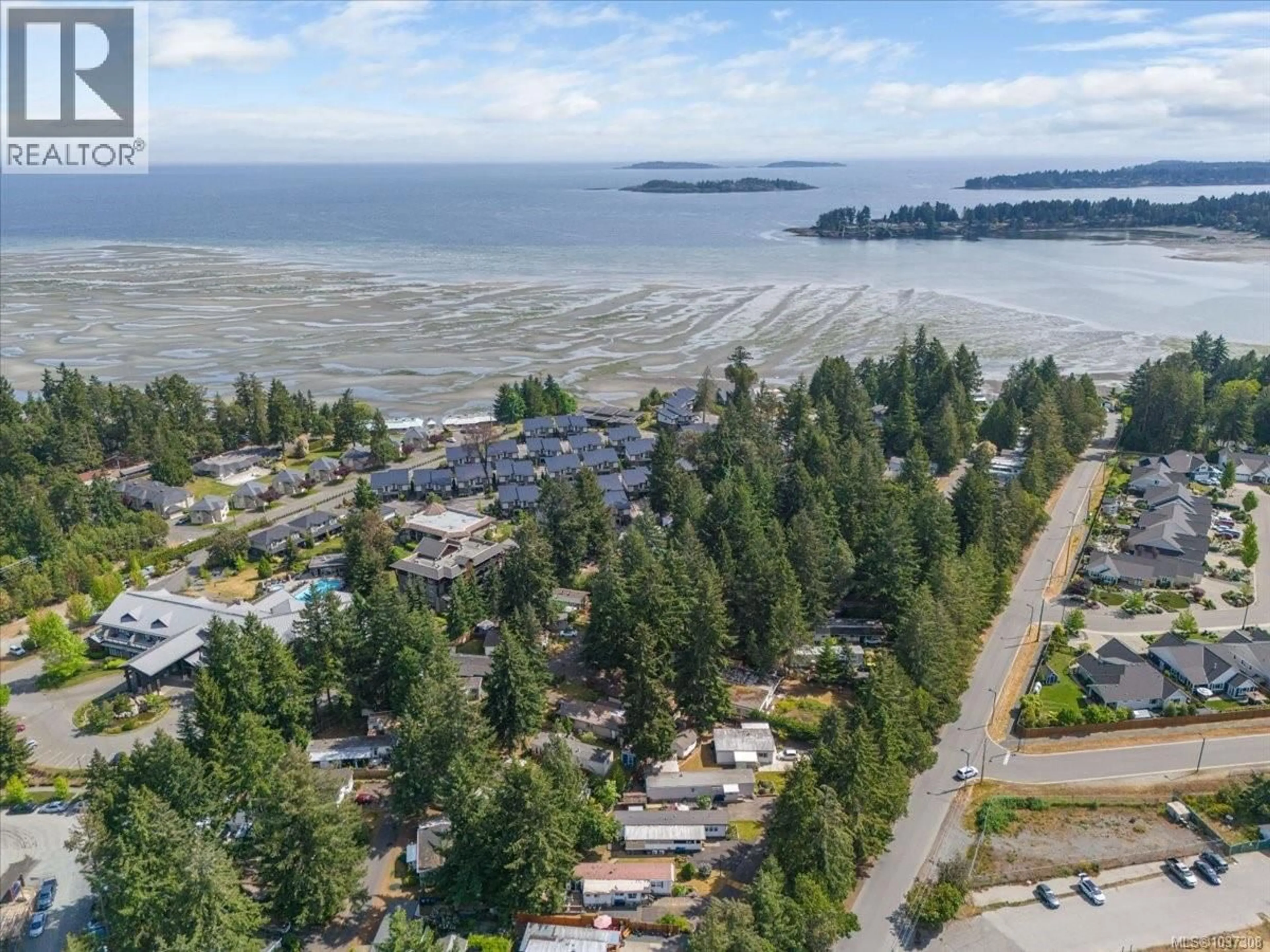 A pic from outside/outdoor area/front of a property/back of a property/a pic from drone, water/lake/river/ocean view for 53 - 1247 ARBUTUS ROAD, Parksville British Columbia V9P1R3