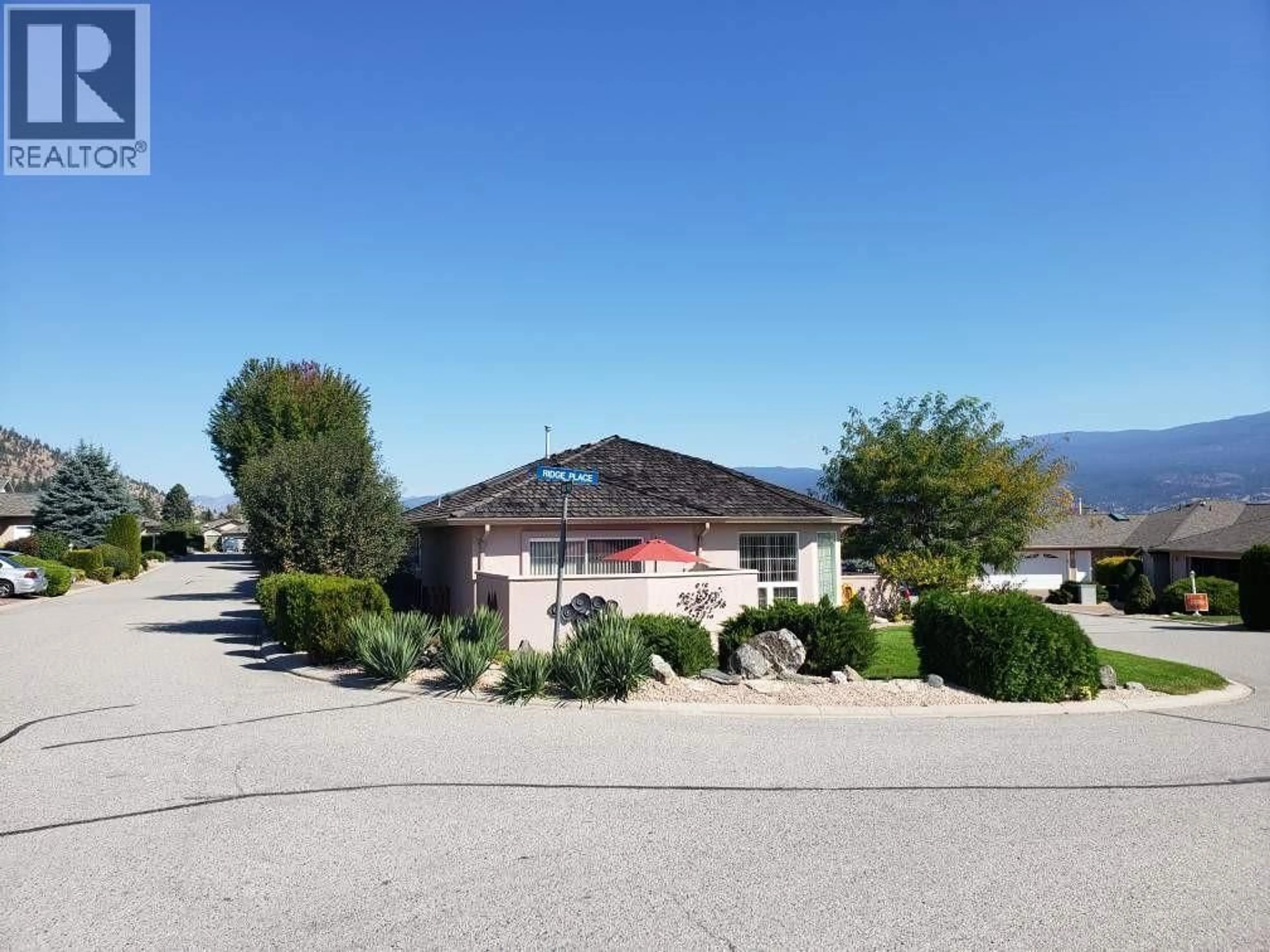 A pic from outside/outdoor area/front of a property/back of a property/a pic from drone, mountain view for 440 RIDGE PLACE, Penticton British Columbia V2A8N7