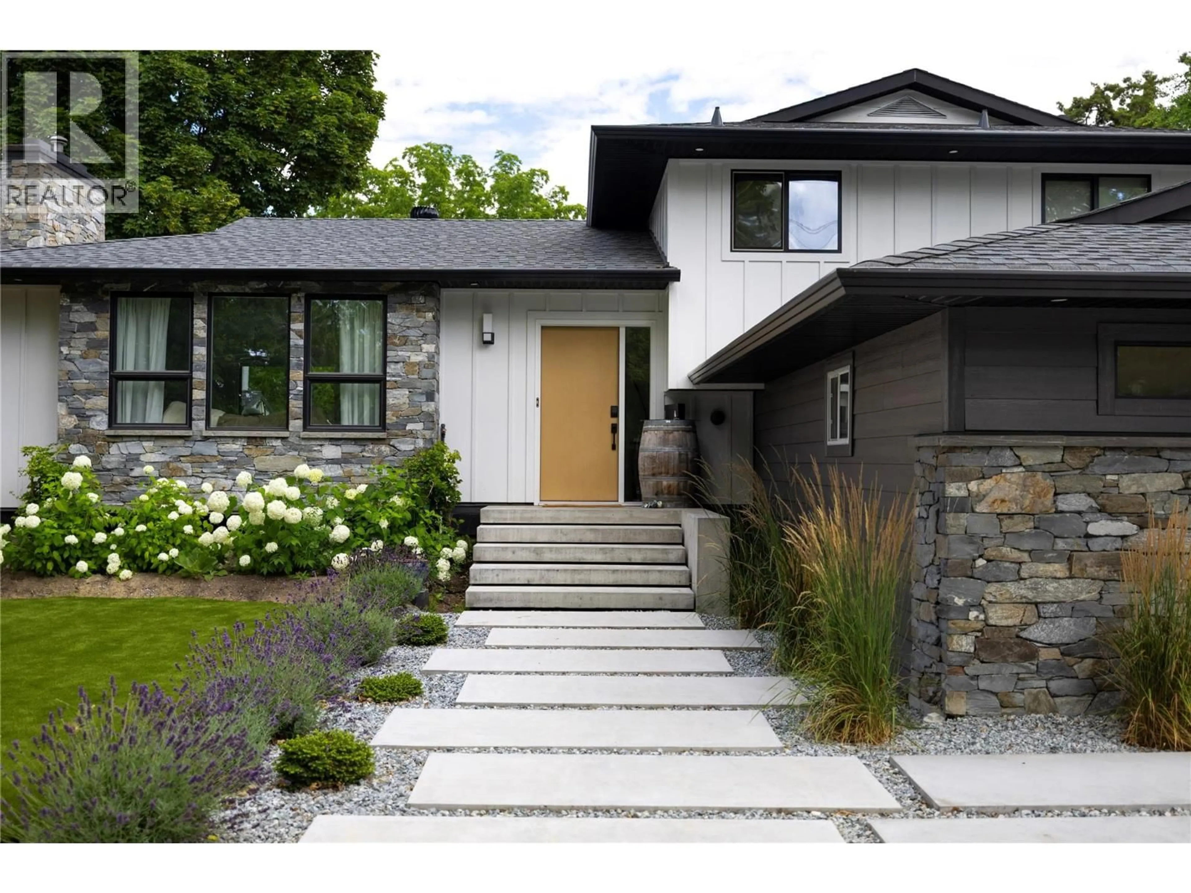 Home with brick exterior material, street for 4265 LAKESHORE ROAD, Kelowna British Columbia V1W1W2