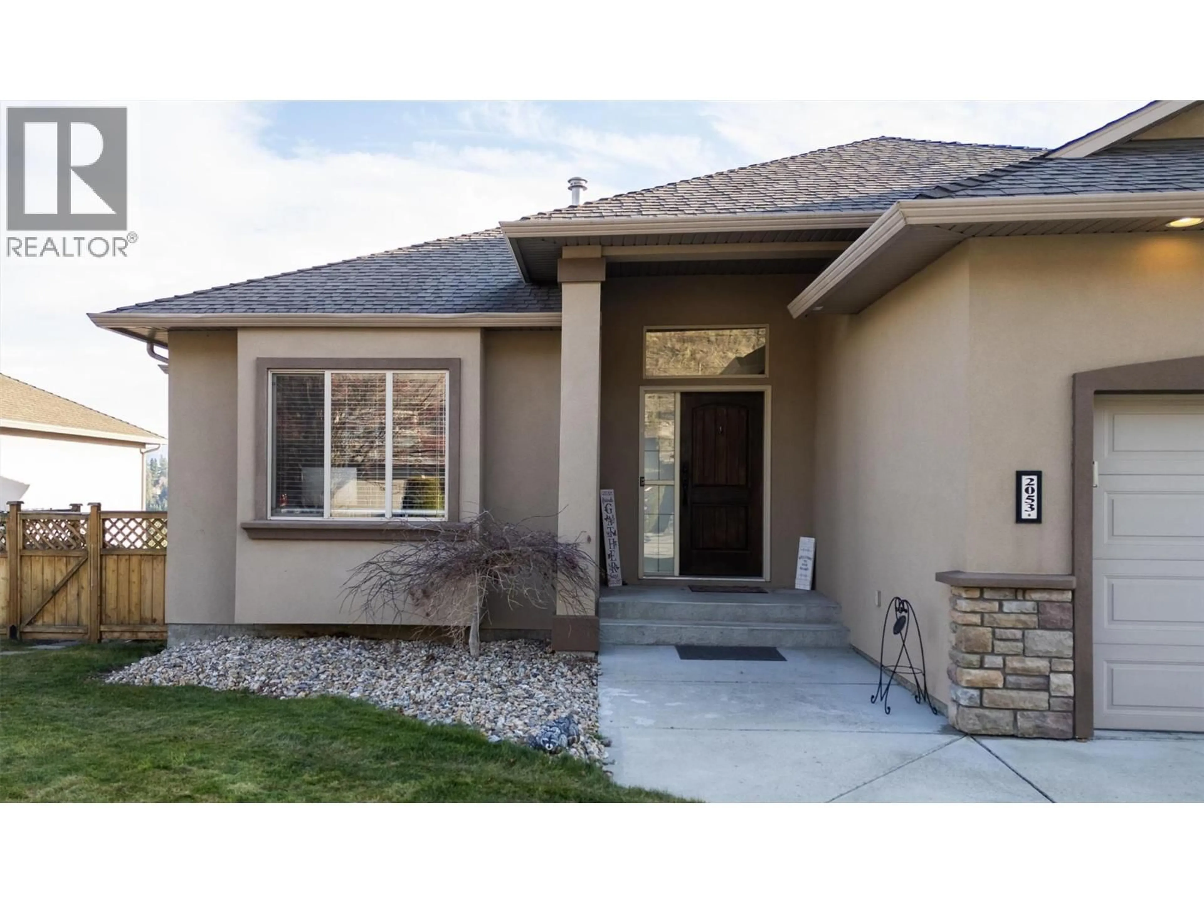 Home with vinyl exterior material, street for 2053 SPYGLASS WAY, West Kelowna British Columbia V1Z3Z7