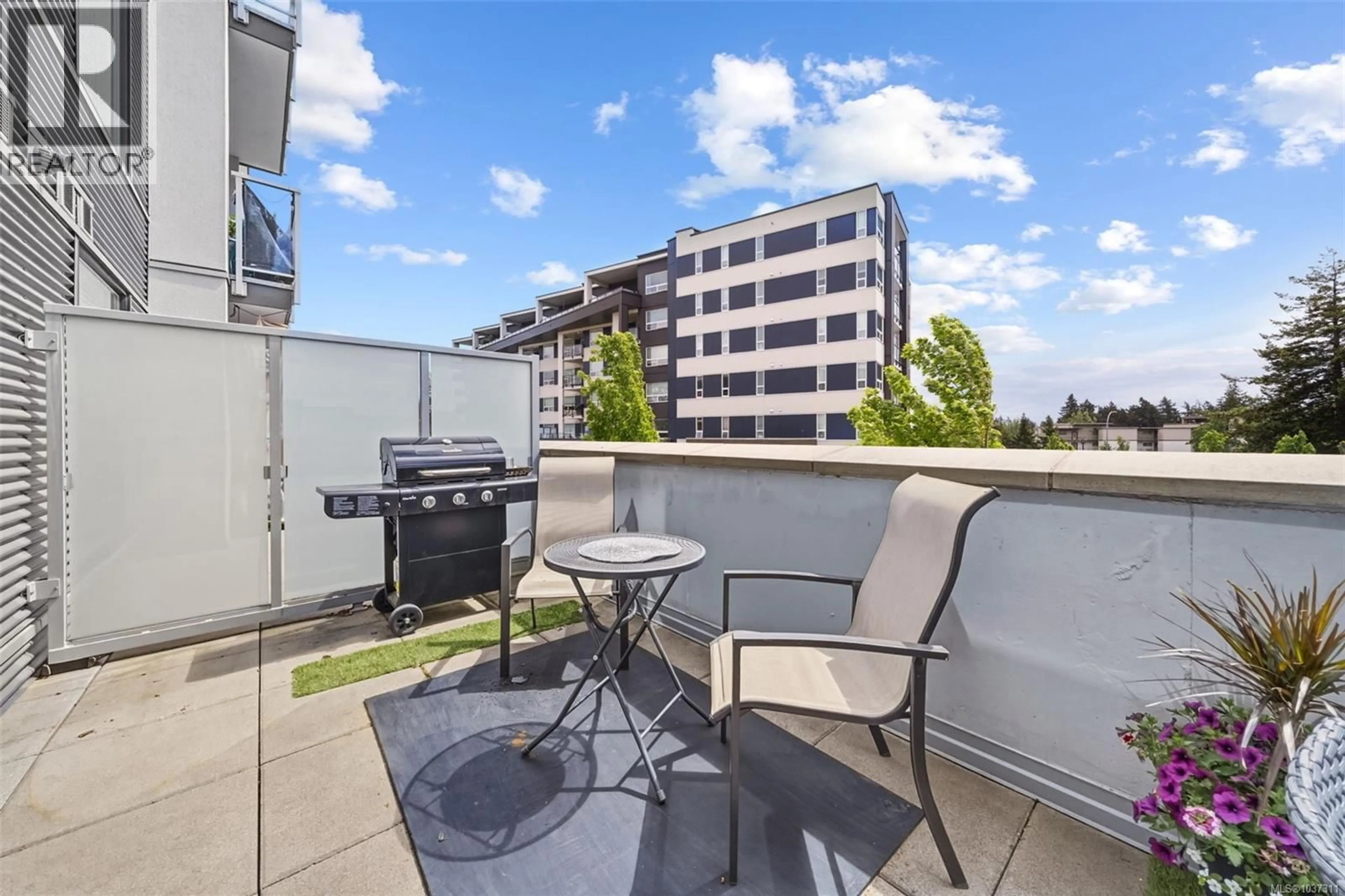 Patio, city buildings view from balcony for 206 - 950 WHIRLAWAY CRESCENT, Langford British Columbia V9B6W6