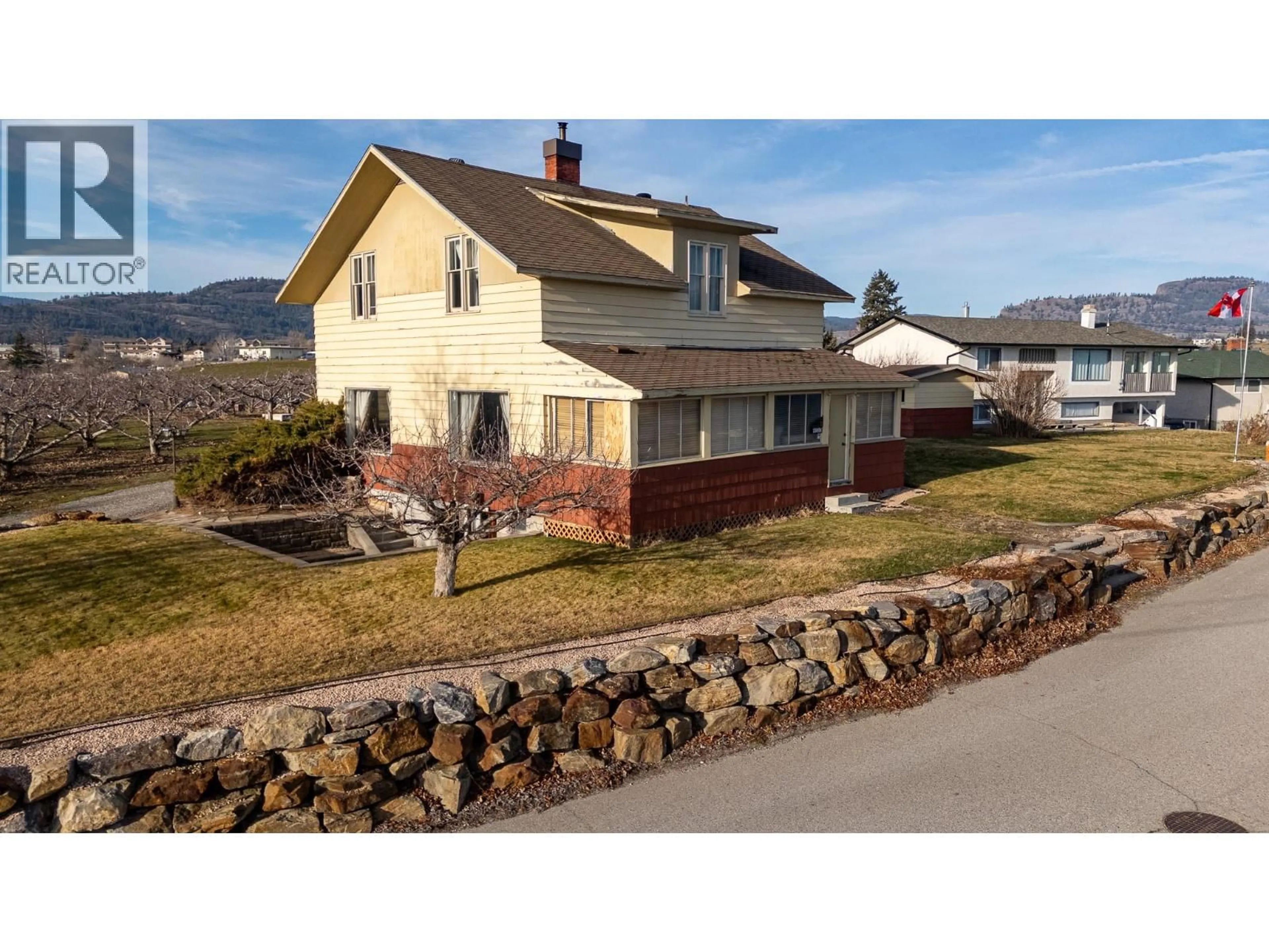 A pic from outside/outdoor area/front of a property/back of a property/a pic from drone, street for 13606 COOKE AVENUE, Summerland British Columbia V0H1Z1