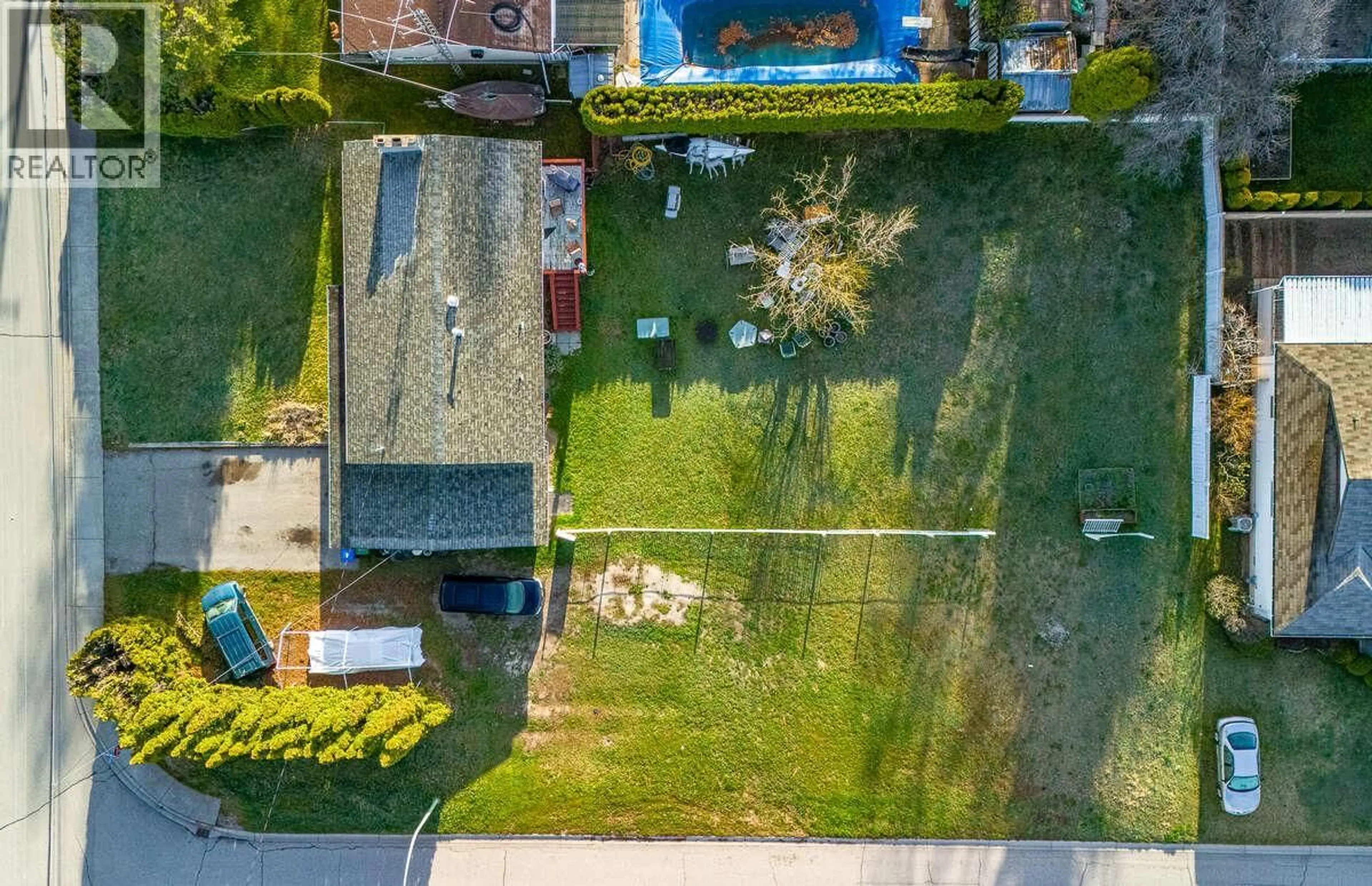 A pic from outside/outdoor area/front of a property/back of a property/a pic from drone, street for 1007 LANFRANCO ROAD, Kelowna British Columbia V1W3X2