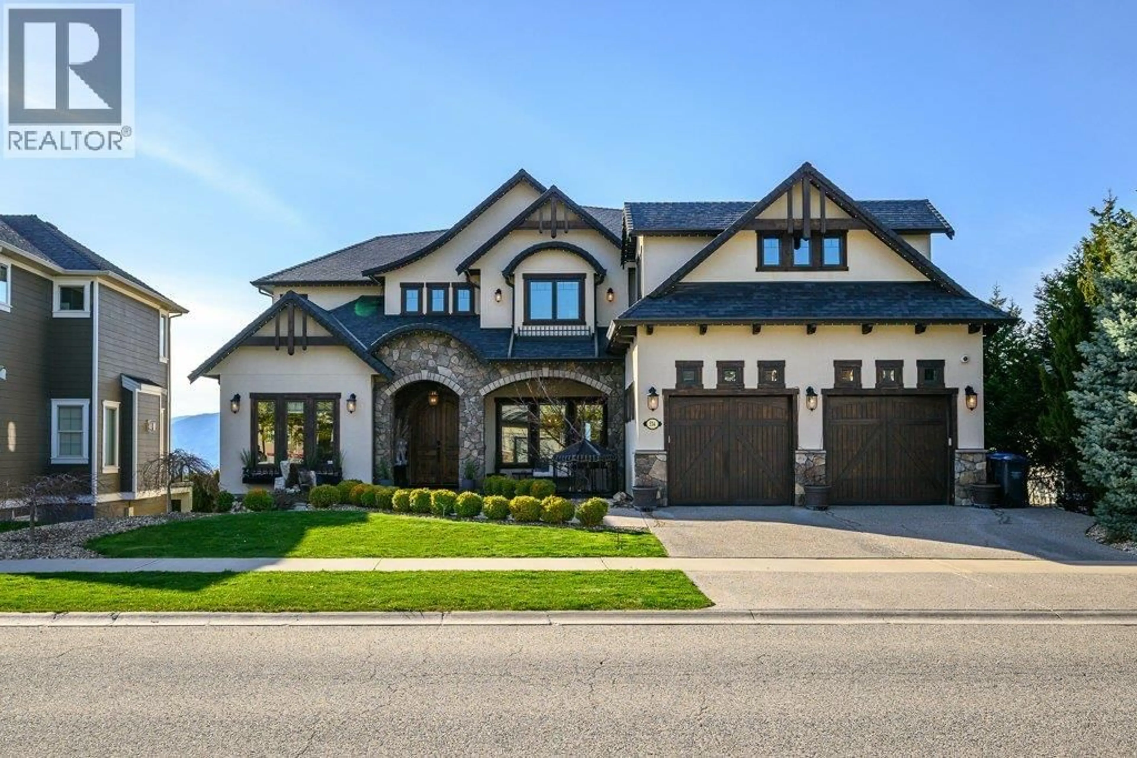 Home with brick exterior material, street for 354 QUILCHENA DRIVE, Kelowna British Columbia V1W4Y9