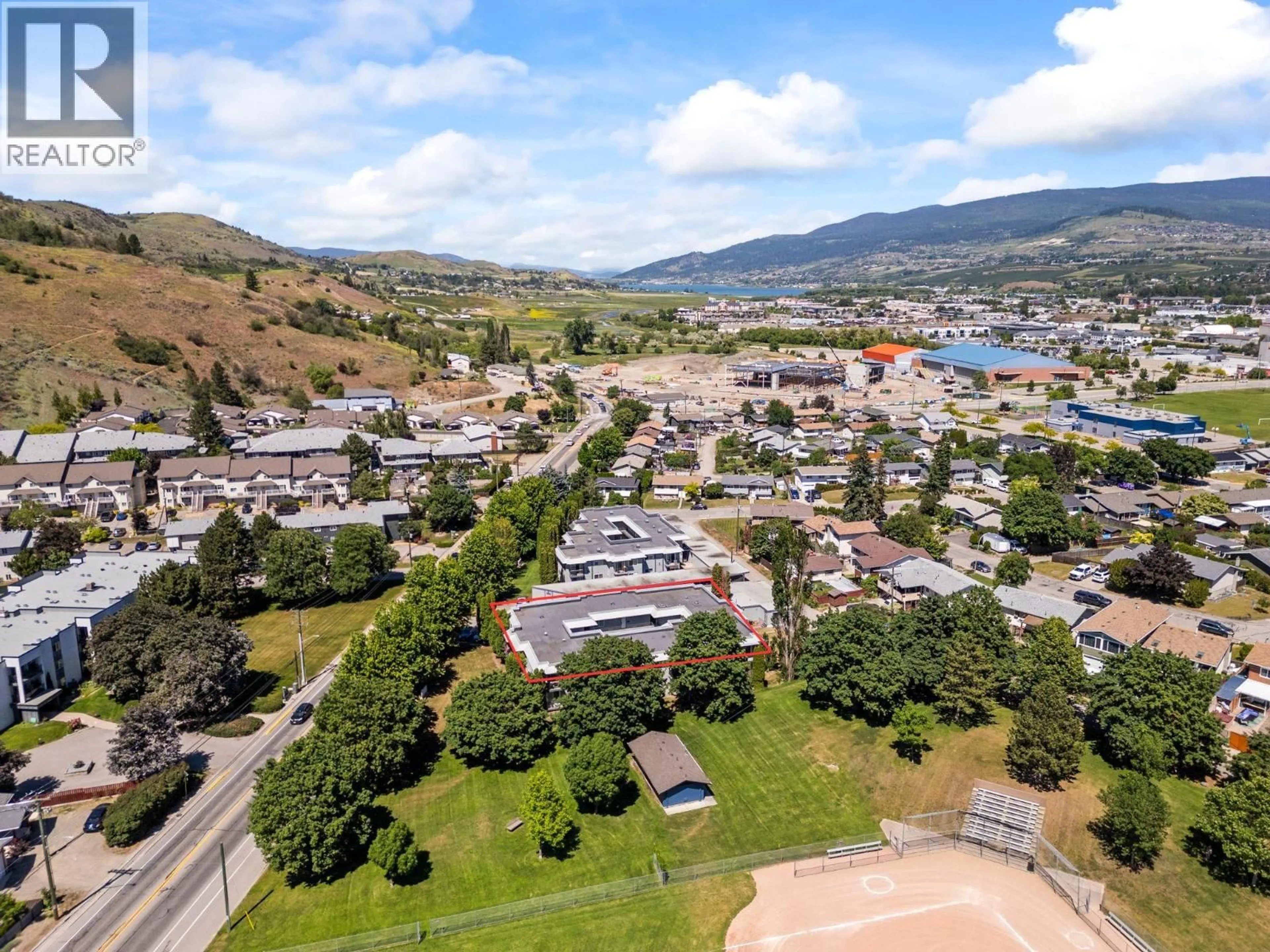 A pic from outside/outdoor area/front of a property/back of a property/a pic from drone, mountain view for 103 - 4101 ALEXIS PARK DRIVE, Vernon British Columbia V1T6H2