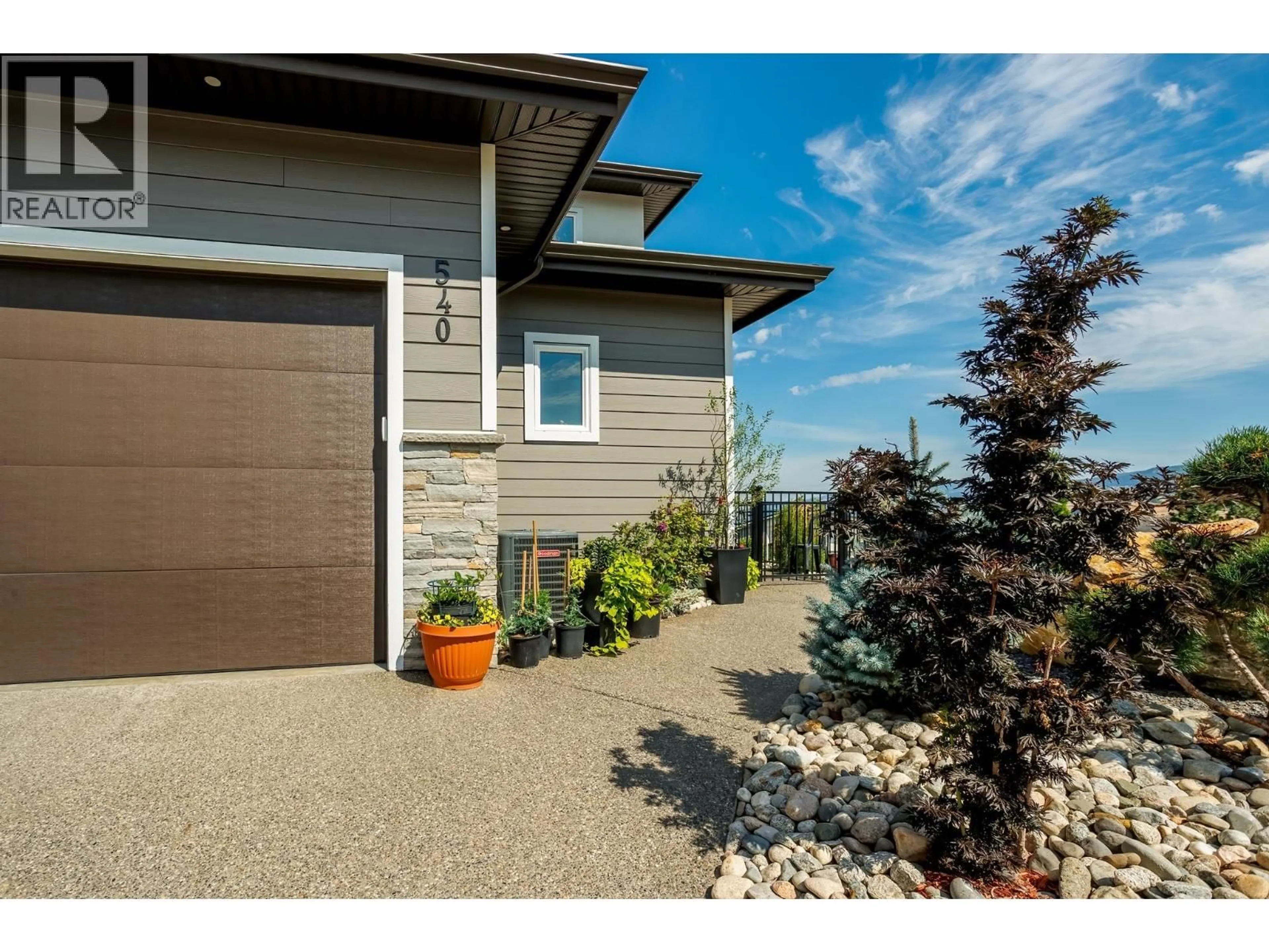 Home with vinyl exterior material, unknown for 540 BARRA LANE, Kelowna British Columbia V1P1T1