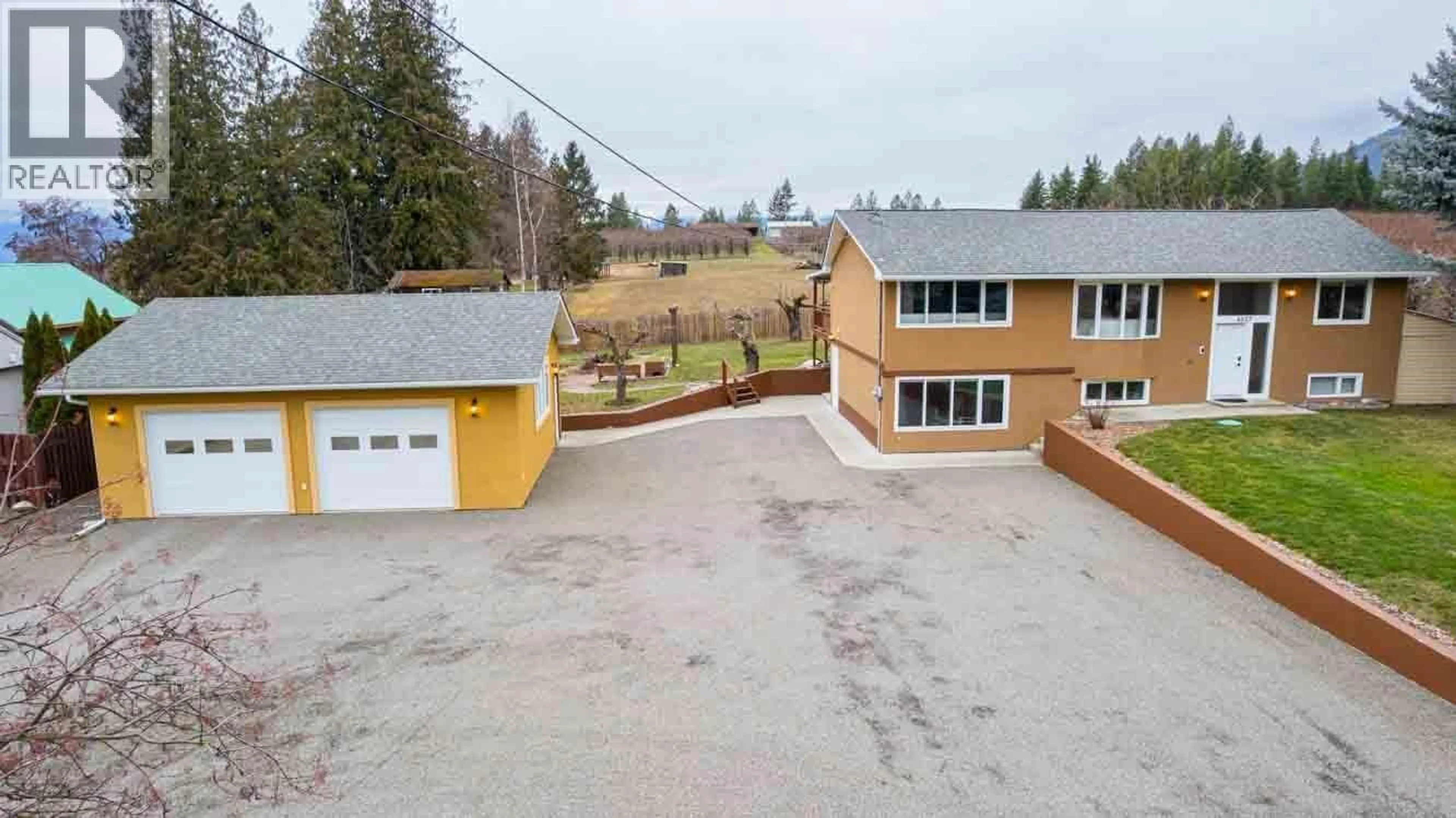 A pic from outside/outdoor area/front of a property/back of a property/a pic from drone, unknown for 4857 CANYON LISTER ROAD, Canyon British Columbia V0B1C1