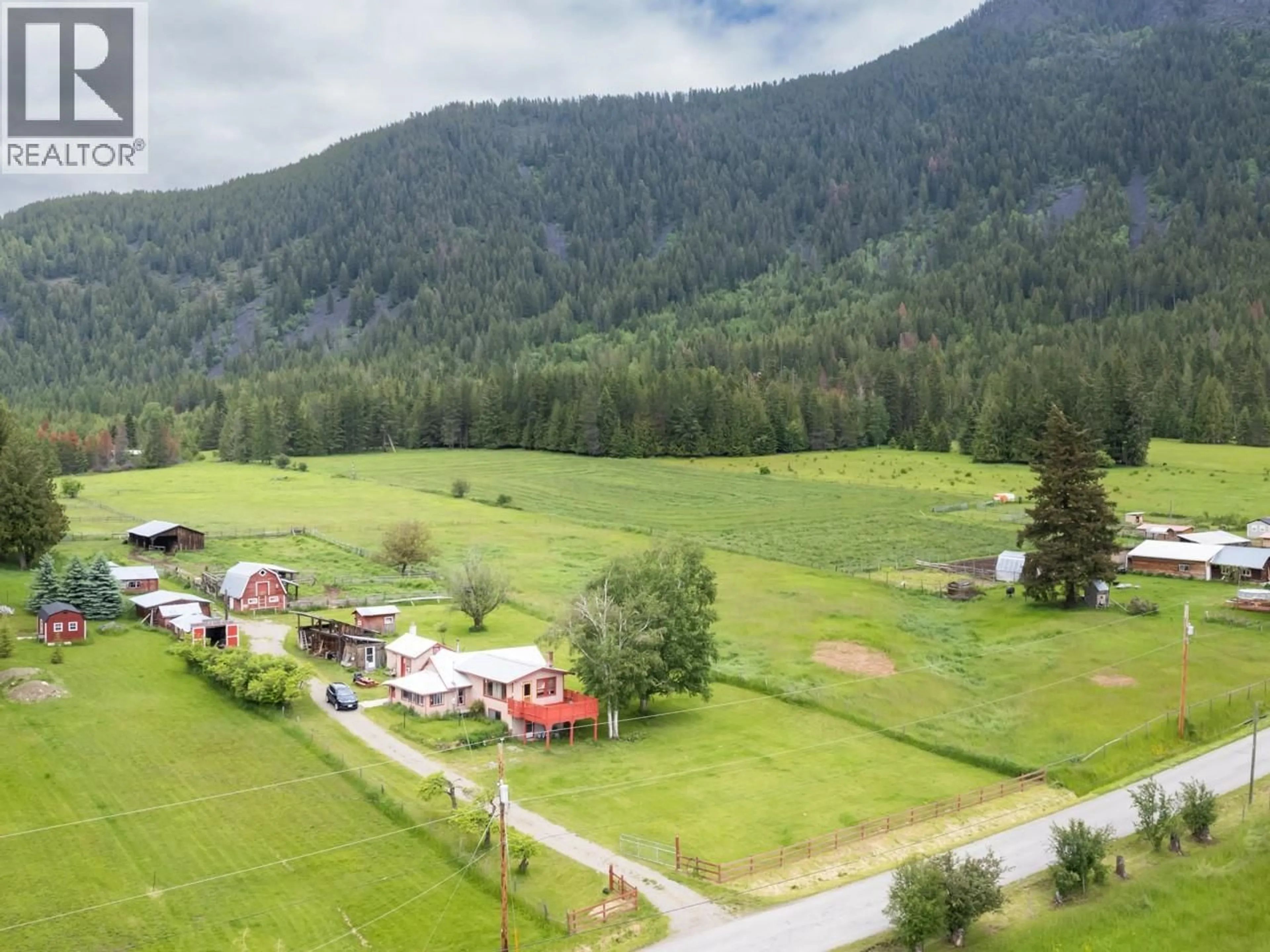 A pic from outside/outdoor area/front of a property/back of a property/a pic from drone, mountain view for 4512 48TH STREET, Canyon British Columbia V0B1C1