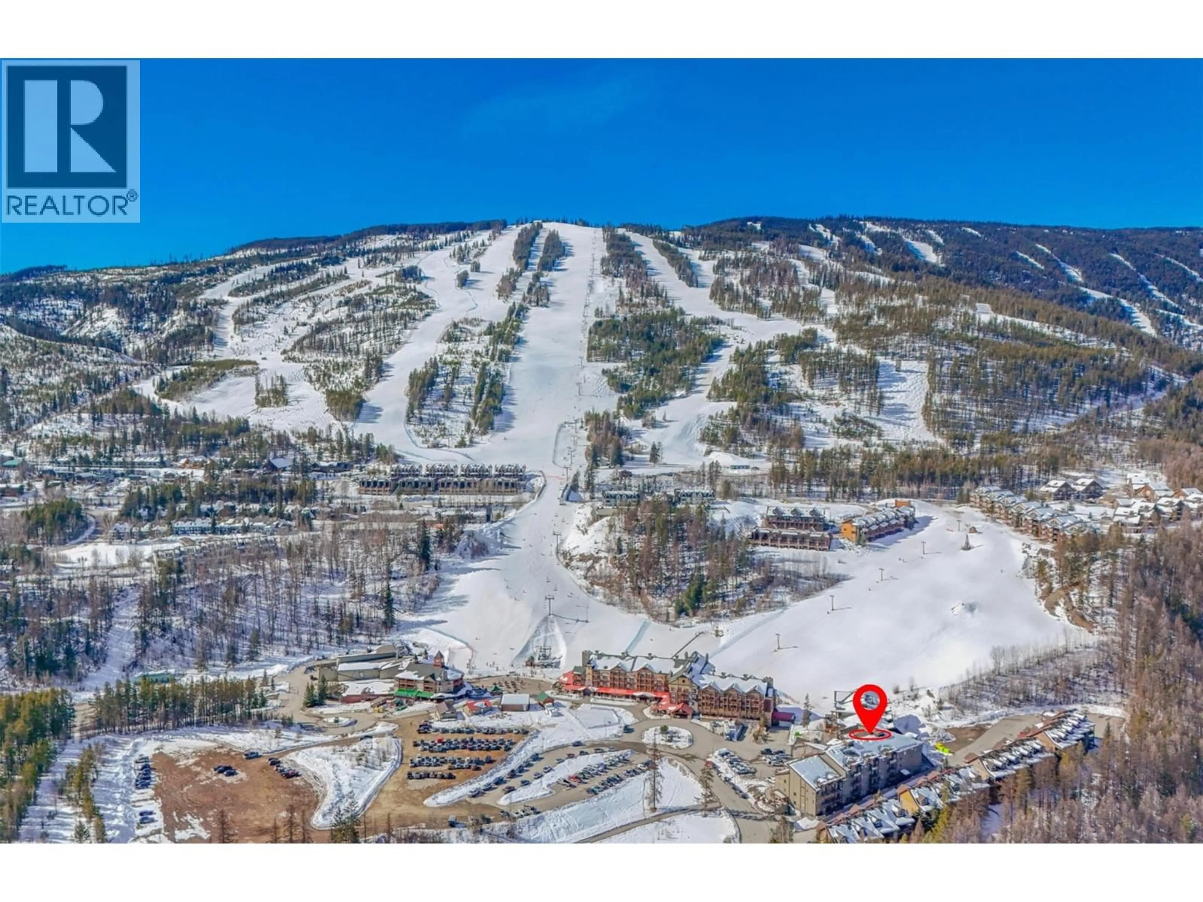 A pic from outside/outdoor area/front of a property/back of a property/a pic from drone, mountain view for 419 - 400 STEMWINDER DRIVE, Kimberley British Columbia V1A2Y9