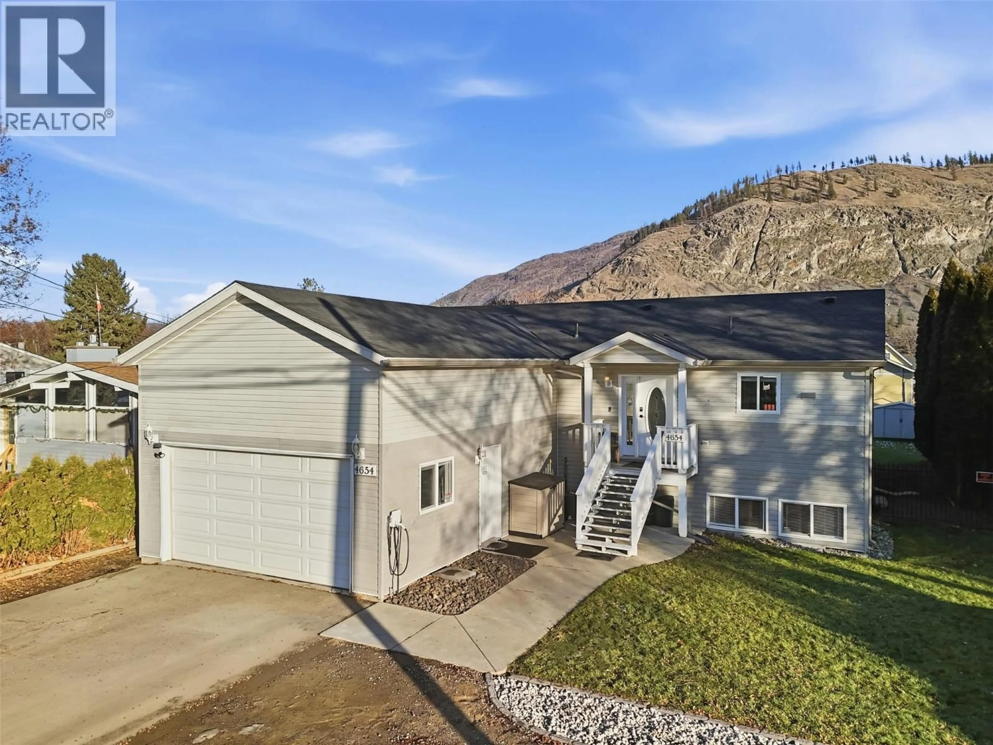 Home with vinyl exterior material, mountain view for 4654 SPURRAWAY ROAD, Kamloops British Columbia V2H1M7