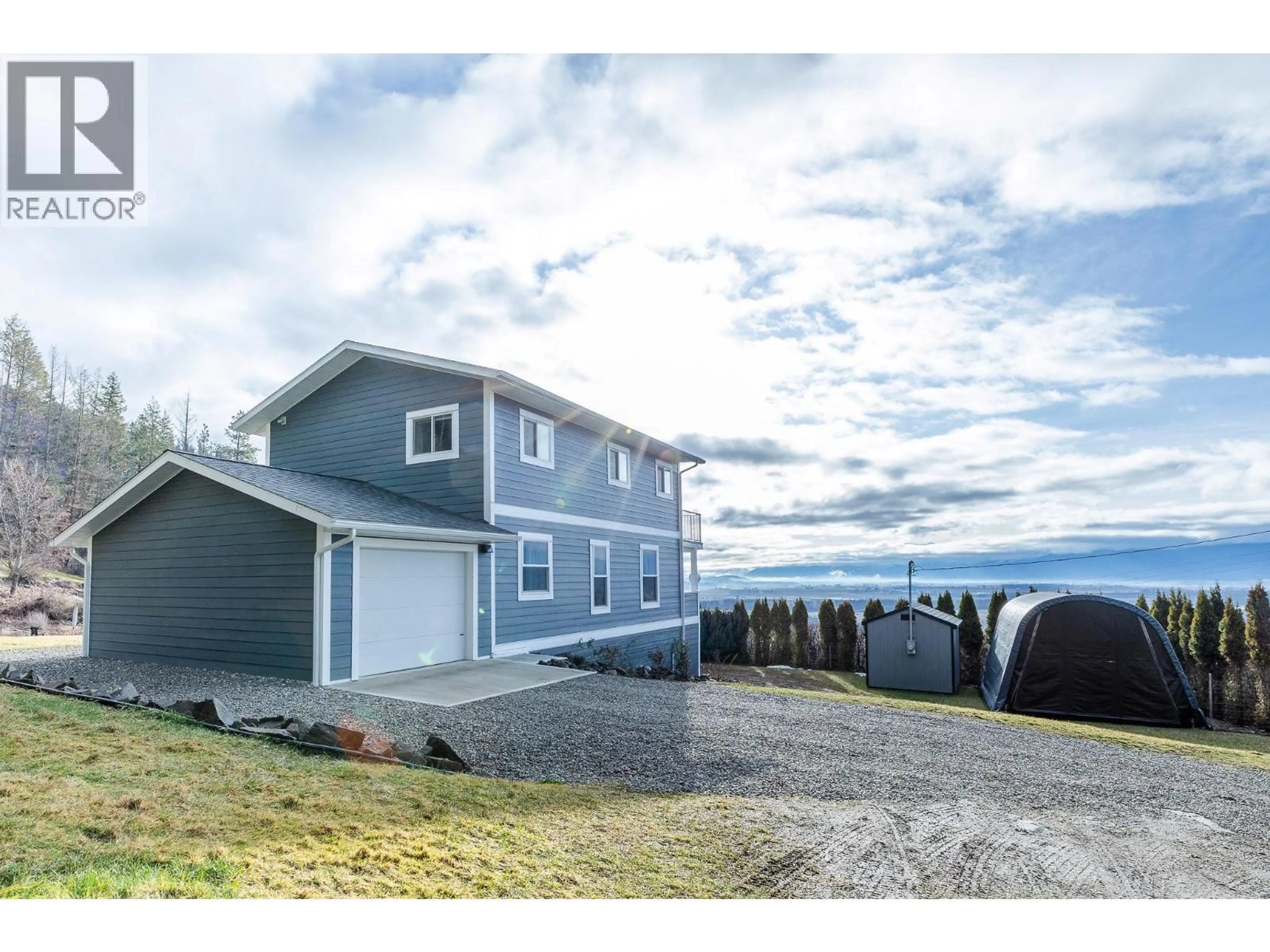 A pic from outside/outdoor area/front of a property/back of a property/a pic from drone, water/lake/river/ocean view for 5650 BATHIE ROAD, Wynndel British Columbia V0B2N2