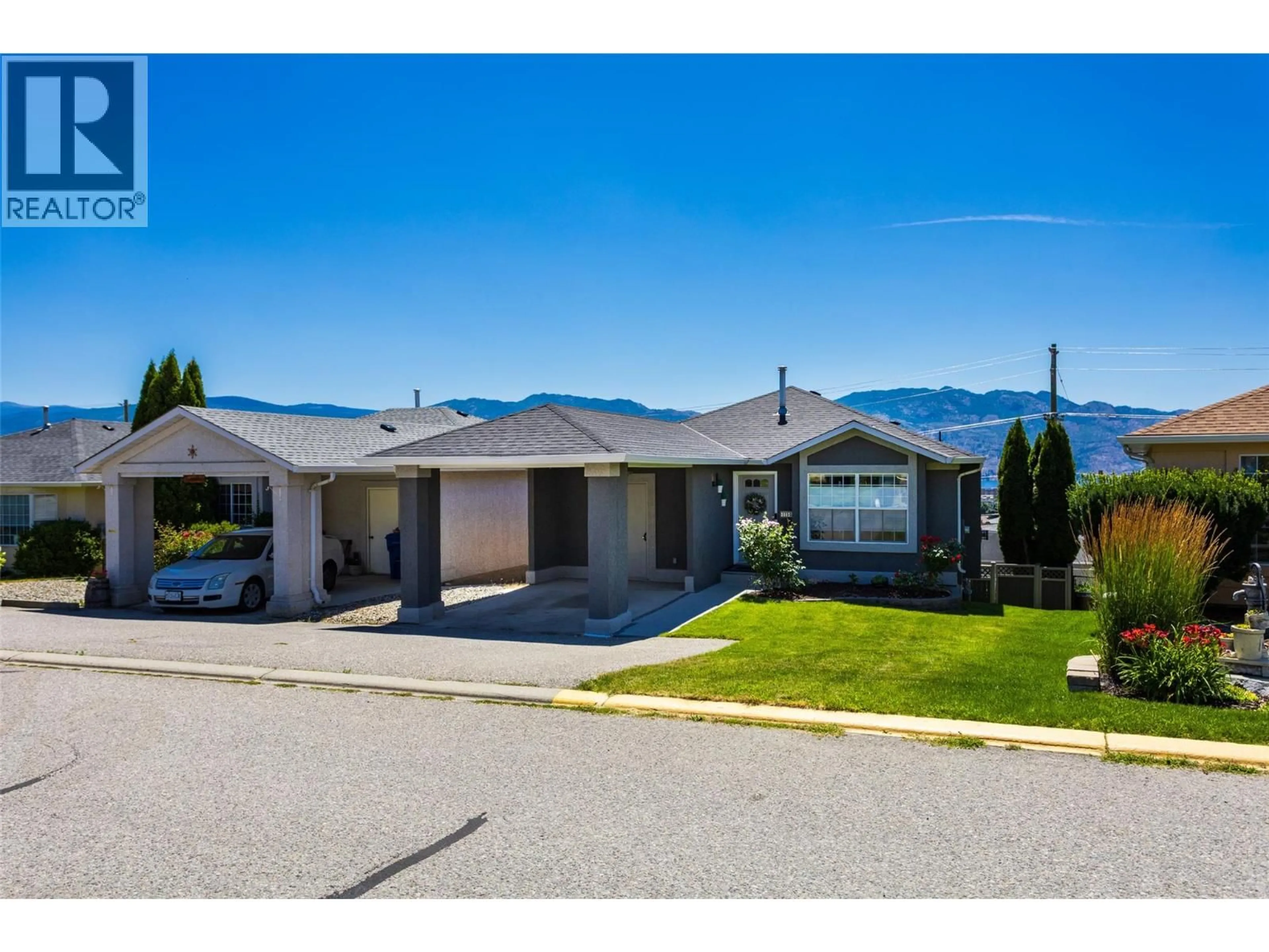 A pic from outside/outdoor area/front of a property/back of a property/a pic from drone, mountain view for 1114 - 2440 OLD OKANAGAN HIGHWAY, West Kelowna British Columbia V4T1X6