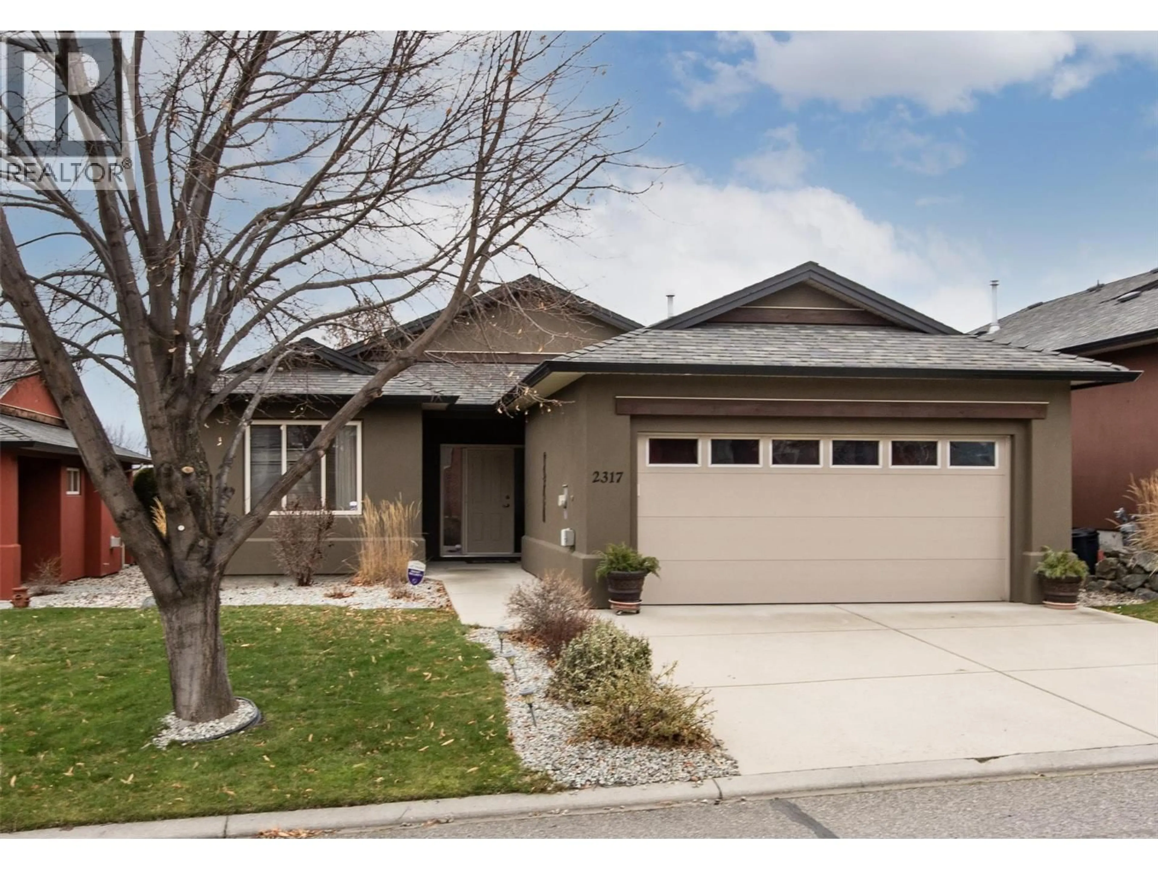 Home with vinyl exterior material, street for 2317 PINE VISTA PLACE, West Kelowna British Columbia V4T2Y1