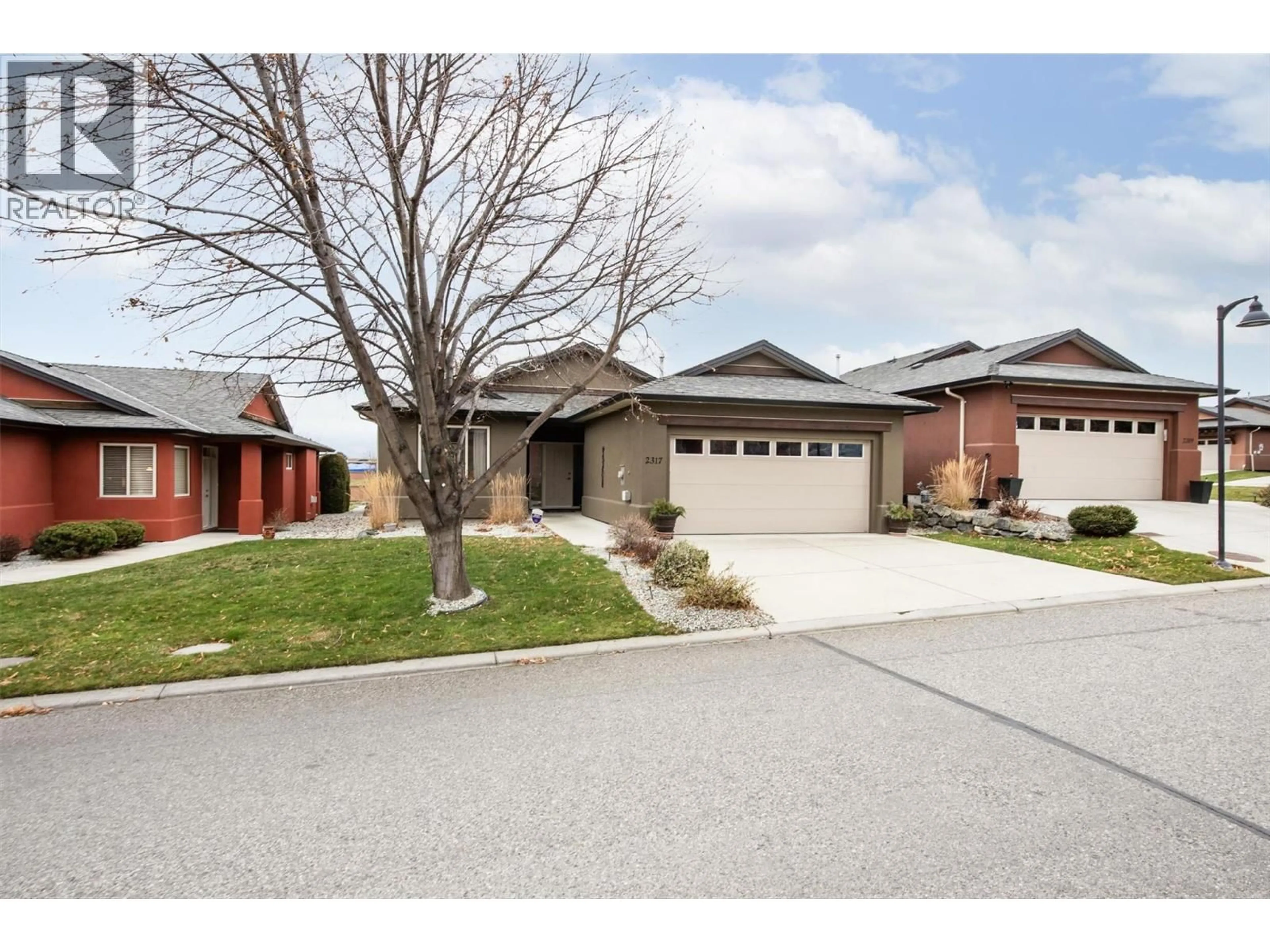 Home with brick exterior material, street for 2317 PINE VISTA PLACE, West Kelowna British Columbia V4T2Y1