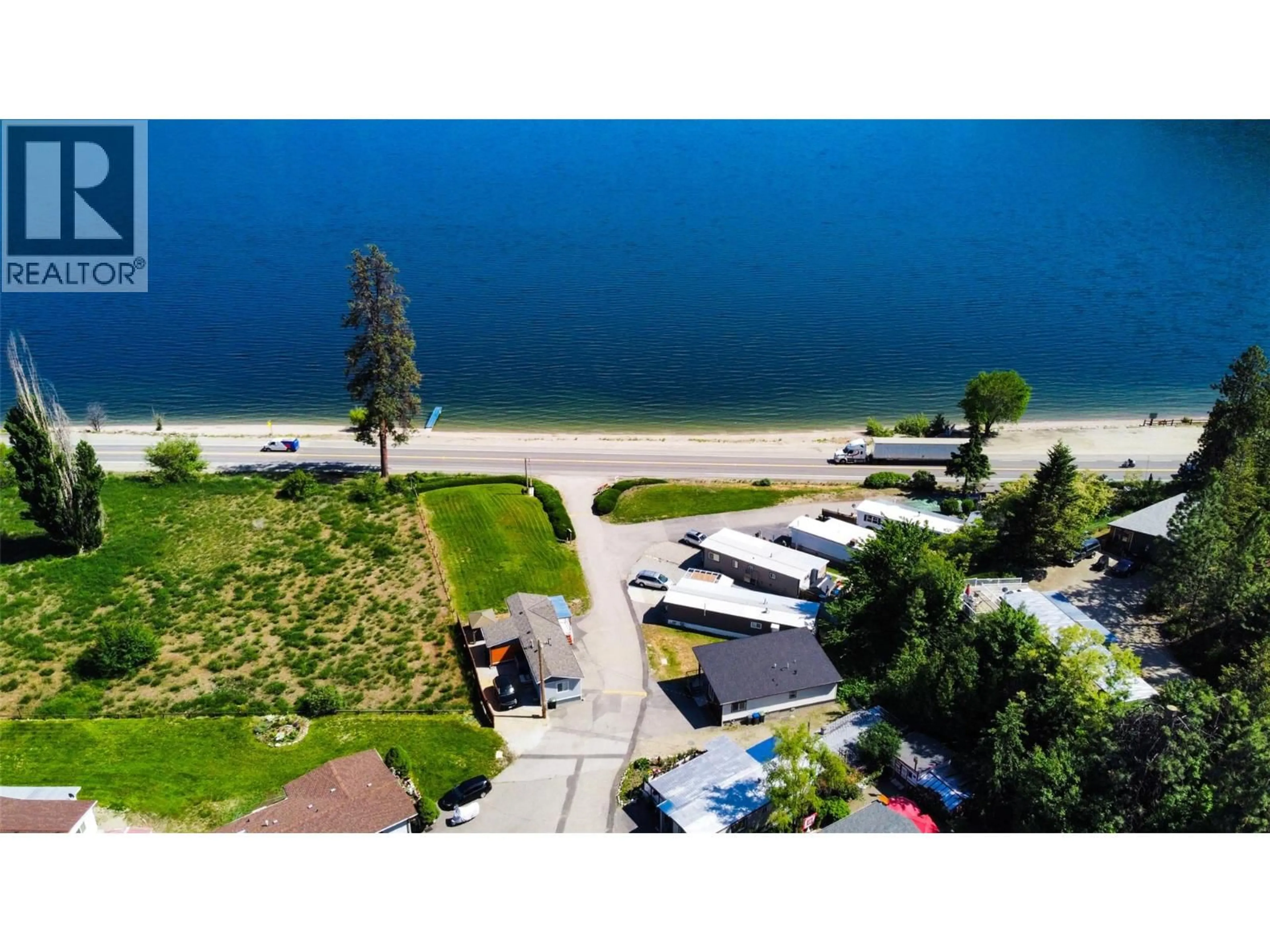 A pic from outside/outdoor area/front of a property/back of a property/a pic from drone, water/lake/river/ocean view for 13 - 6711 97 HIGHWAY, Peachland British Columbia V0H1X9