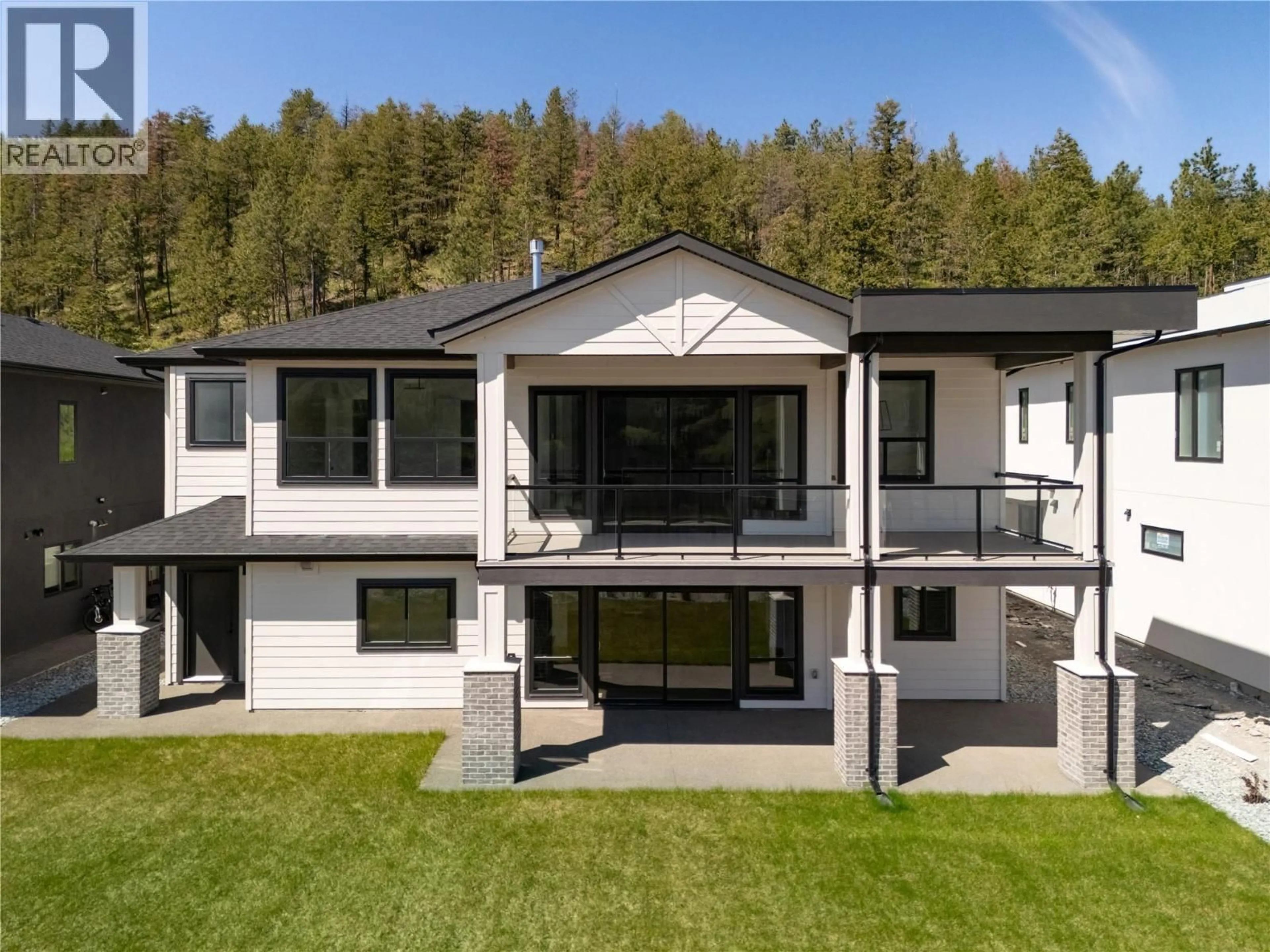 Home with vinyl exterior material, mountain view for 893 LOSETH DRIVE, Kelowna British Columbia V1P0A8