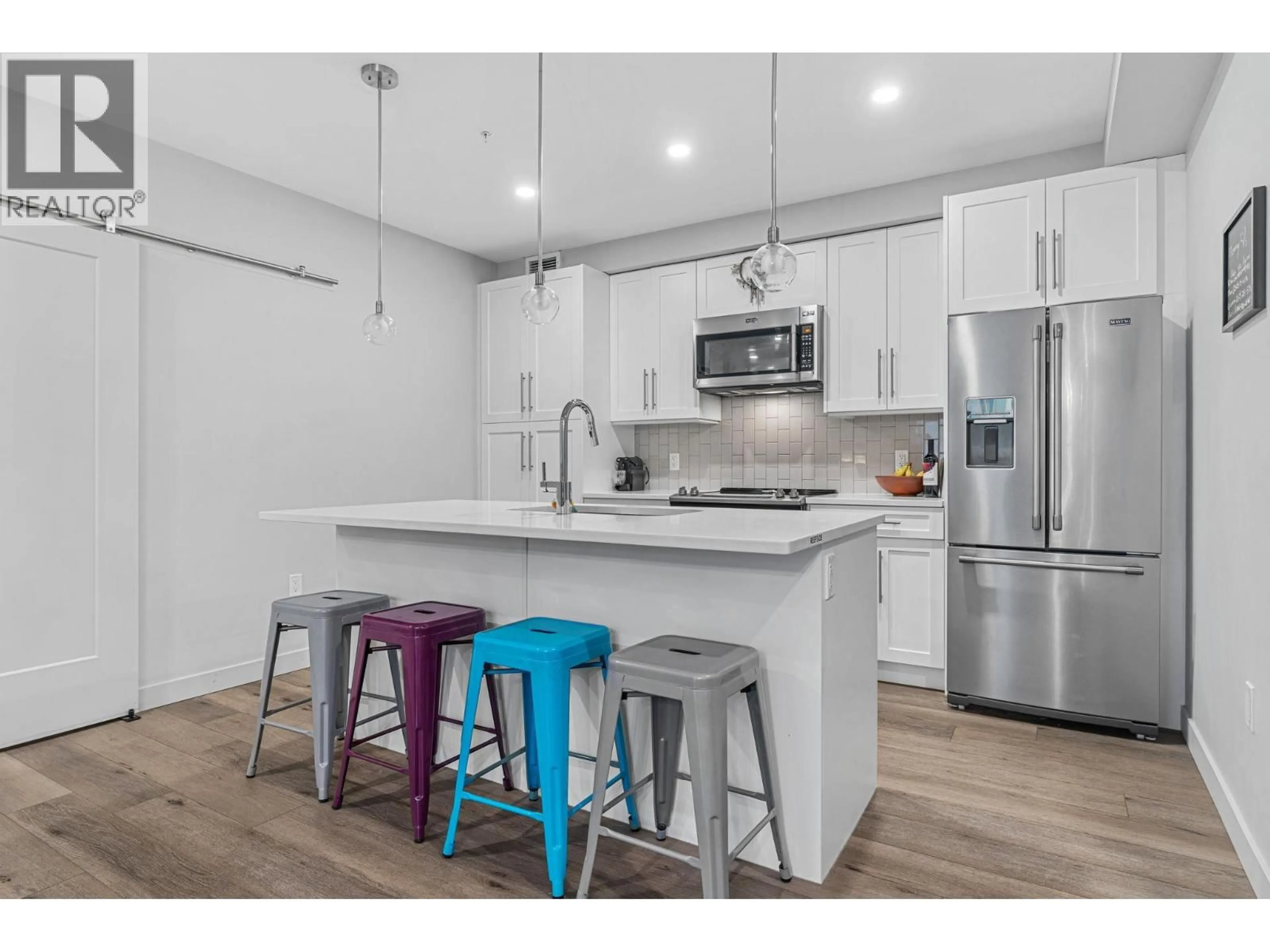 Open concept kitchen, unknown for 106 - 3630 MISSION SPRINGS DRIVE, Kelowna British Columbia V1W0B2