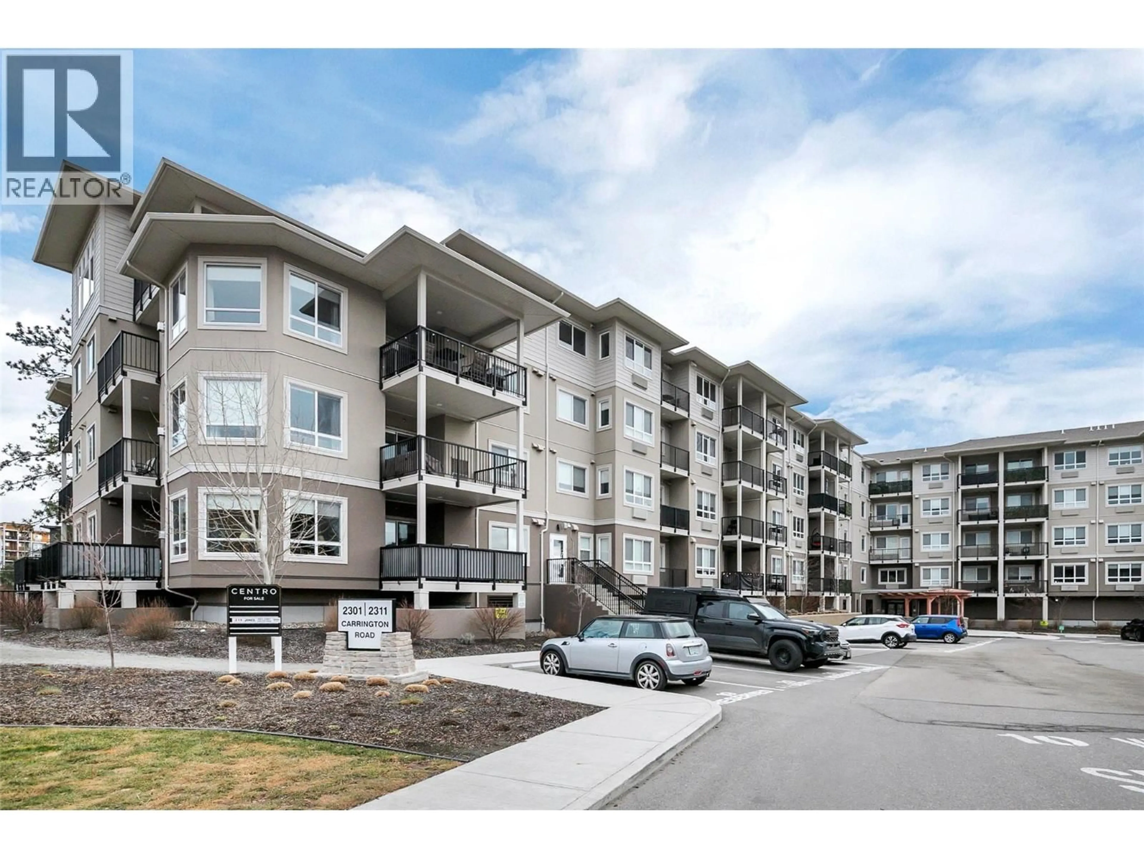 A pic from outside/outdoor area/front of a property/back of a property/a pic from drone, unknown for 407 - 2301 CARRINGTON ROAD, West Kelowna British Columbia V4T0E2