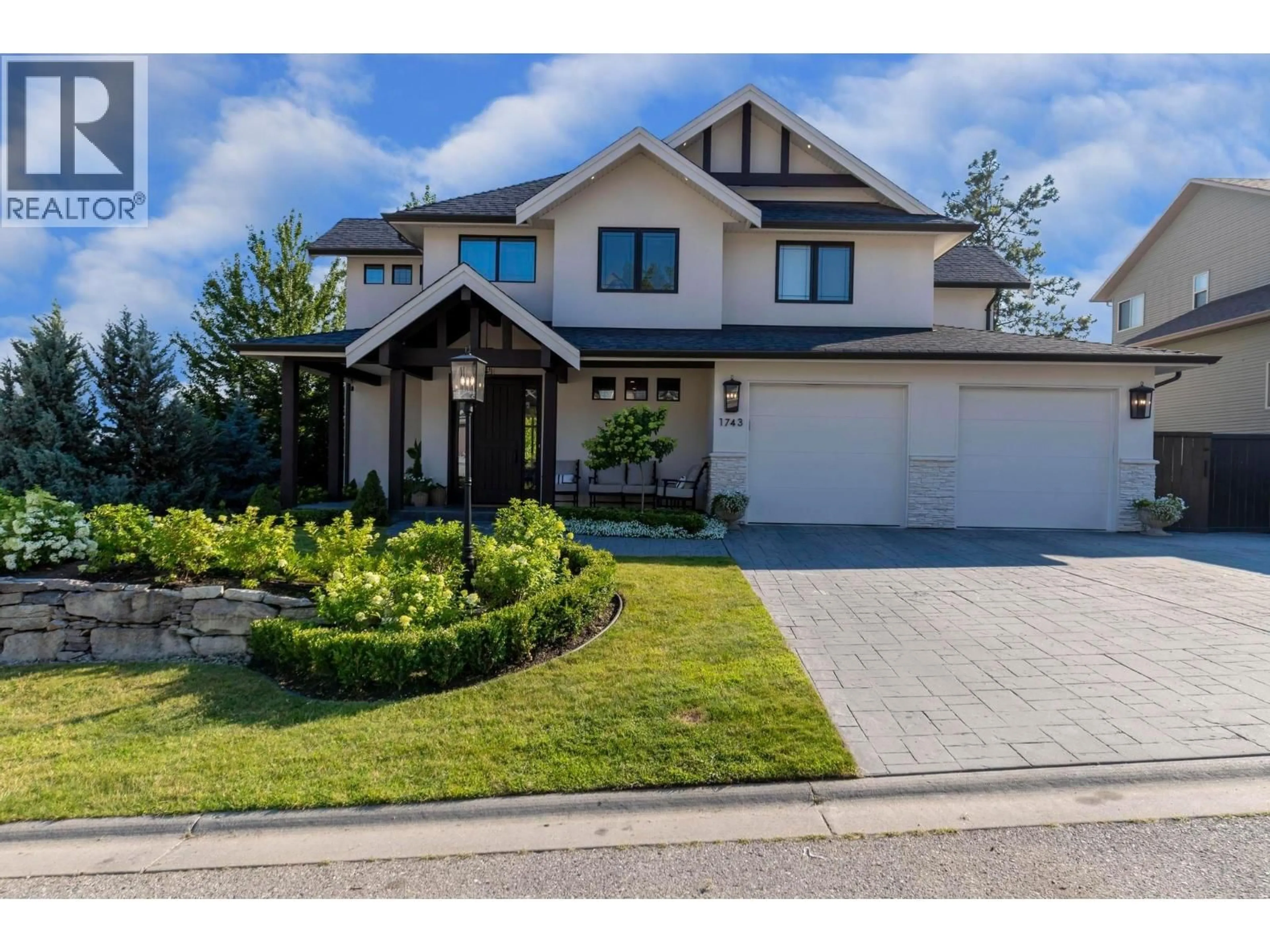 Home with brick exterior material, street for 1743 MARKHAM COURT, Kelowna British Columbia V1V2W1