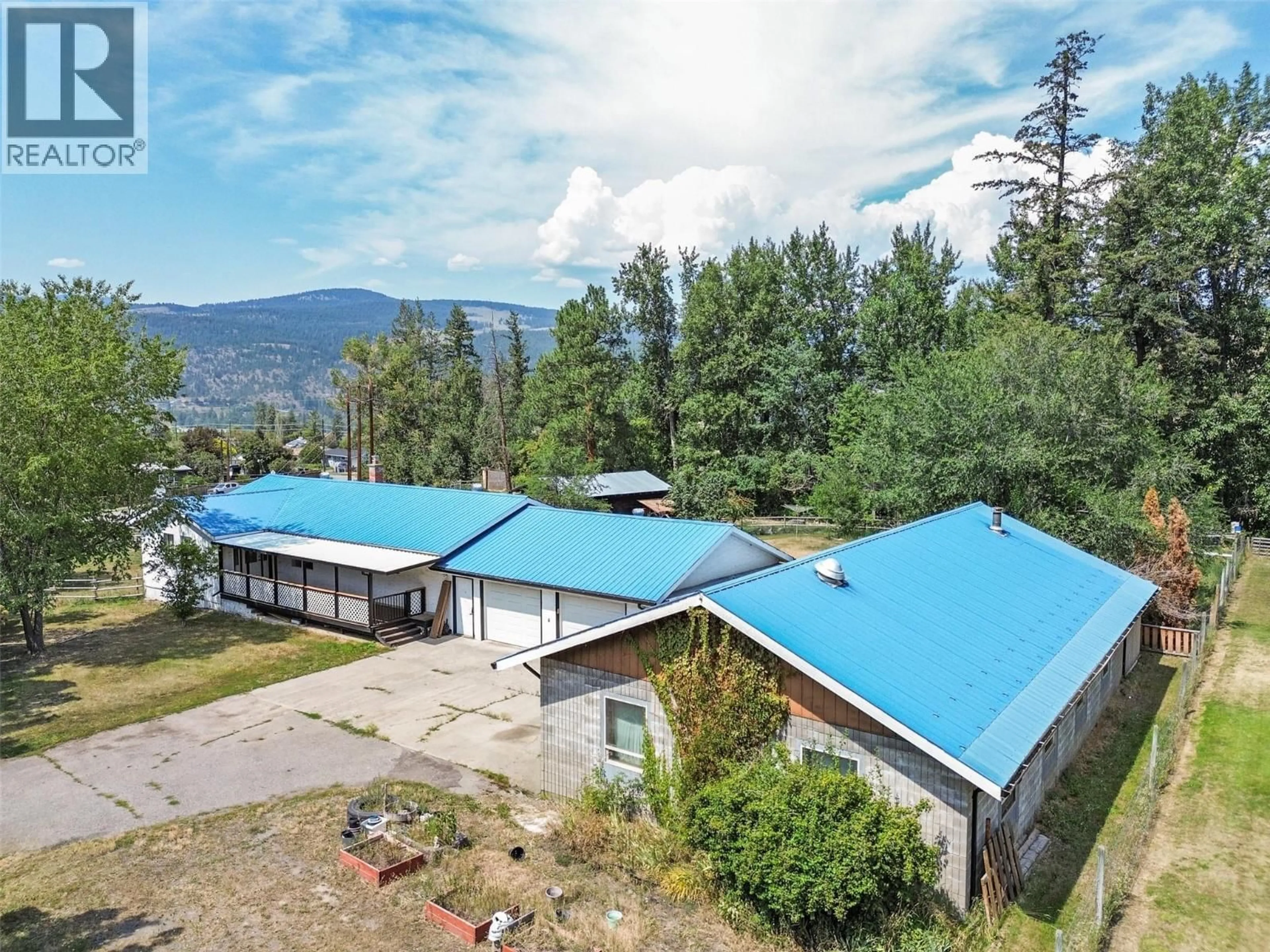 A pic from outside/outdoor area/front of a property/back of a property/a pic from drone, mountain view for 590 LISTER ROAD, Kamloops British Columbia V2H0B8