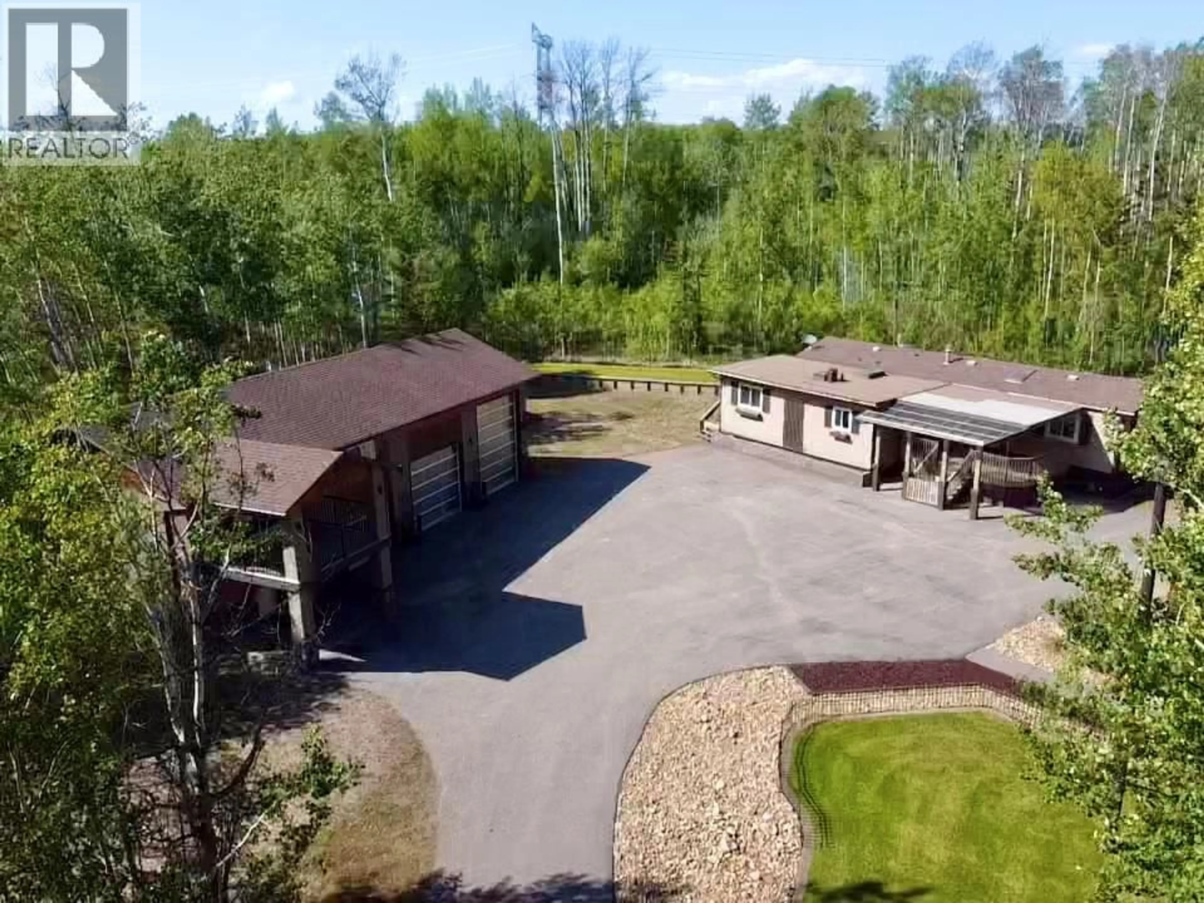 A pic from outside/outdoor area/front of a property/back of a property/a pic from drone, unknown for 4668 208 ROAD, Dawson Creek British Columbia V0C1B0