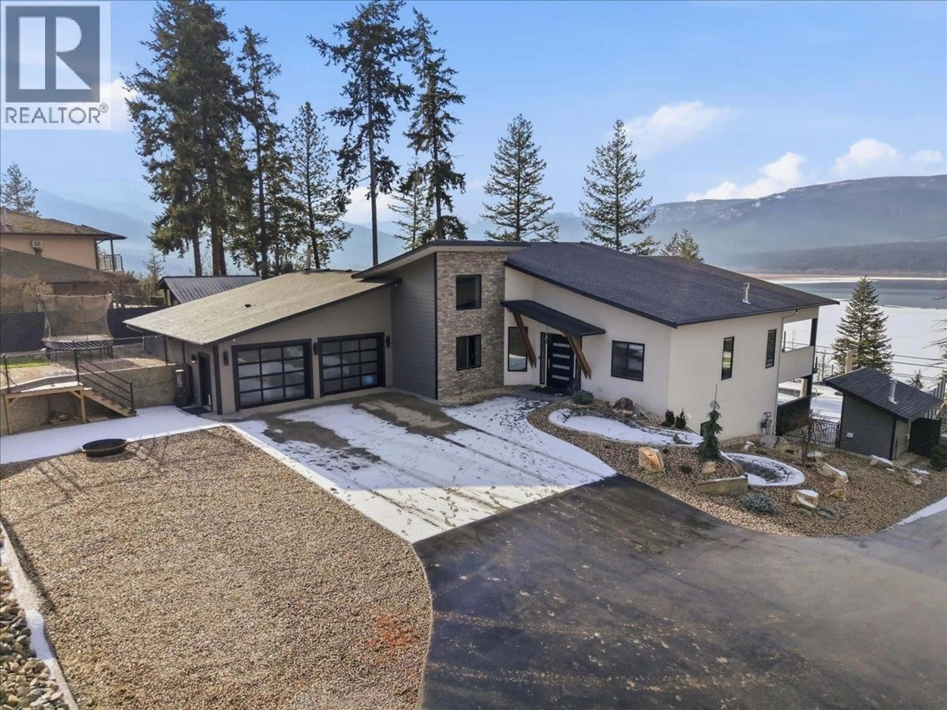A pic from outside/outdoor area/front of a property/back of a property/a pic from drone, mountain view for 3410 LAKESHORE ROAD NORTHEAST, Salmon Arm British Columbia V1E3N4