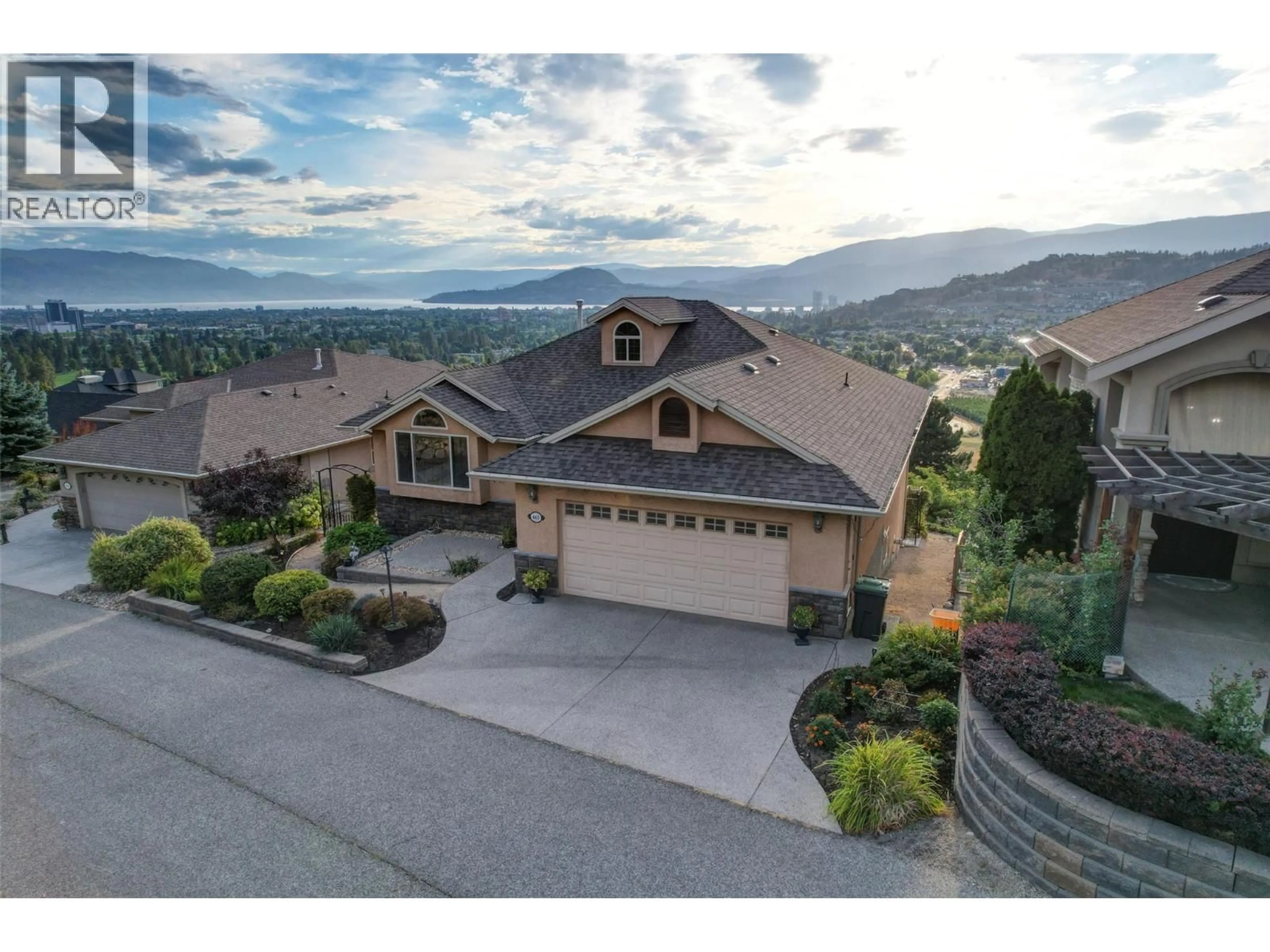 A pic from outside/outdoor area/front of a property/back of a property/a pic from drone, mountain view for 665 DENALI DRIVE, Kelowna British Columbia V1V2P5