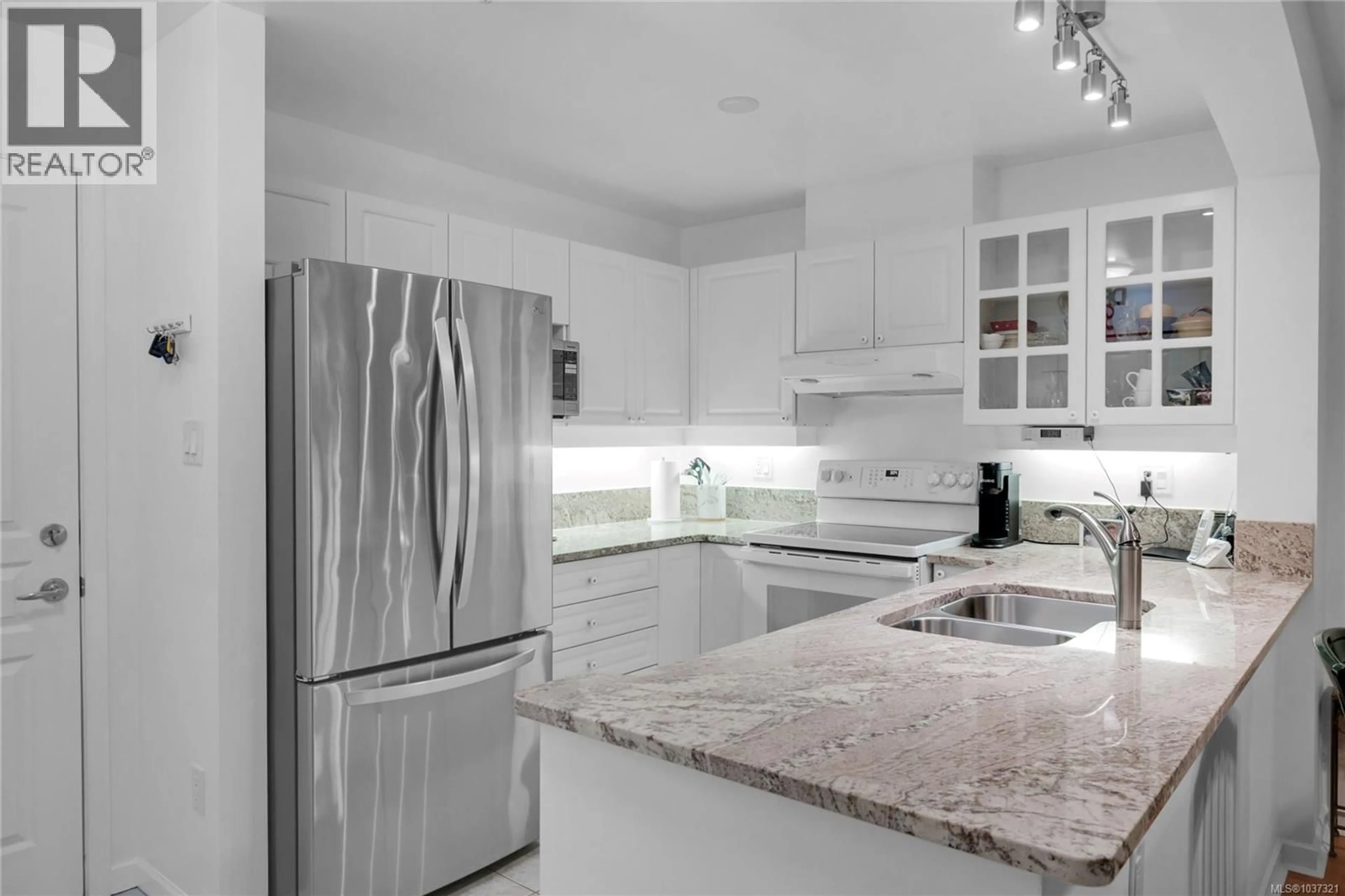 Contemporary kitchen, ceramic/tile floor for 412 - 5685 EDGEWATER LANE, Nanaimo British Columbia V9T6K3