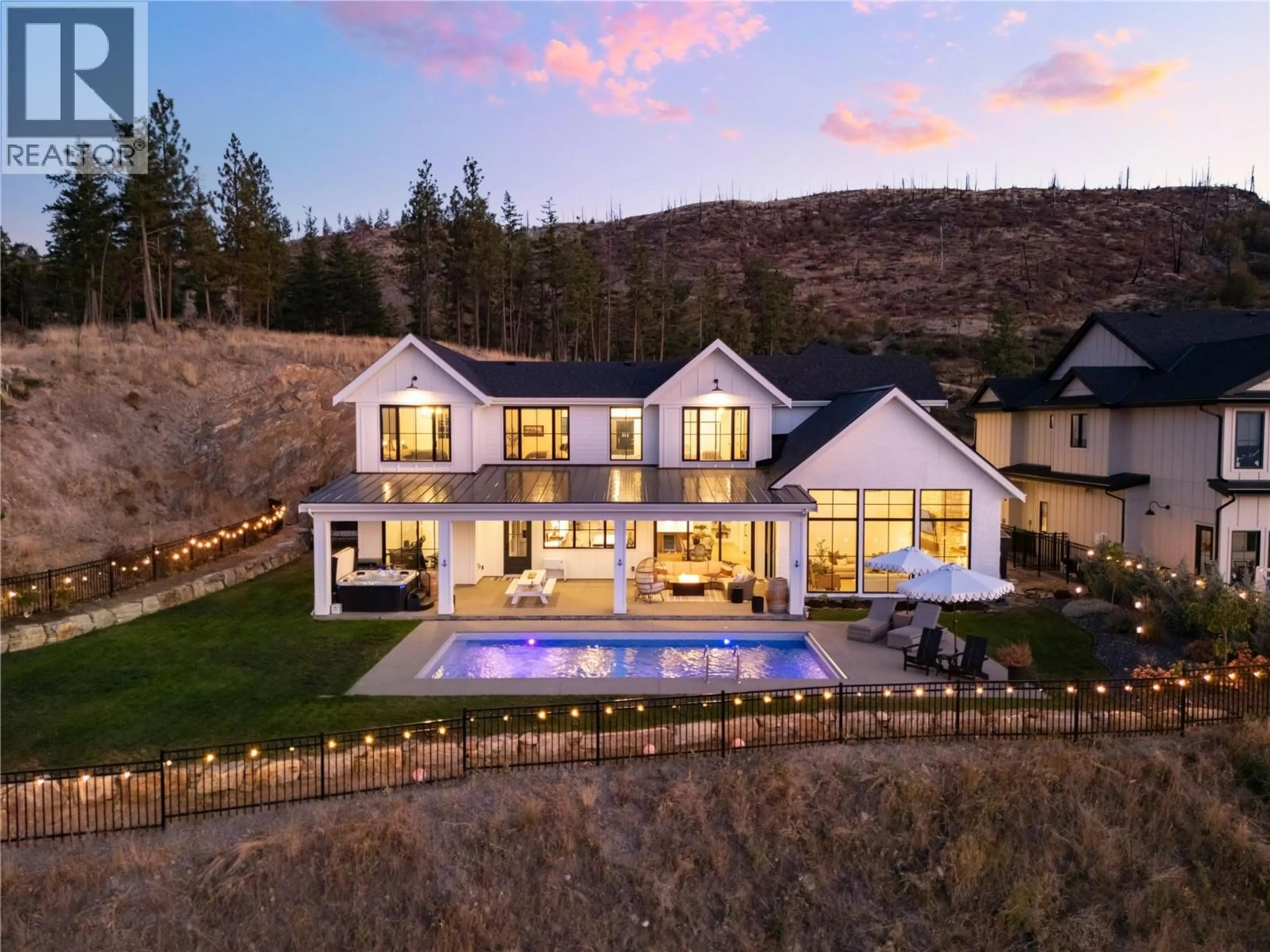 A pic from outside/outdoor area/front of a property/back of a property/a pic from drone, mountain view for 5635 UPPER MISSION COURT, Kelowna British Columbia V1W0C5