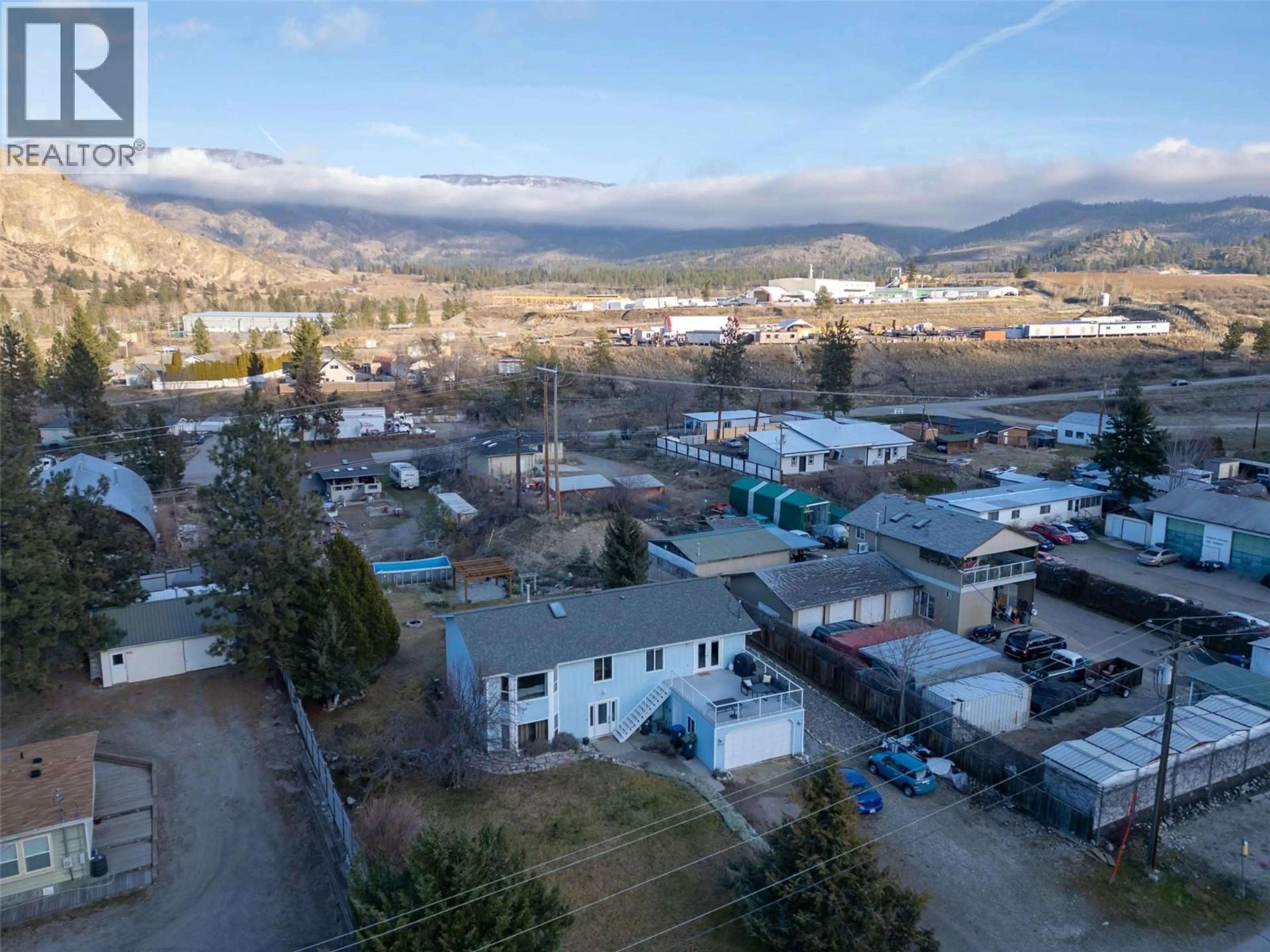 A pic from outside/outdoor area/front of a property/back of a property/a pic from drone, mountain view for 1721 WALLIS ROAD, Okanagan Falls British Columbia V0H1R2
