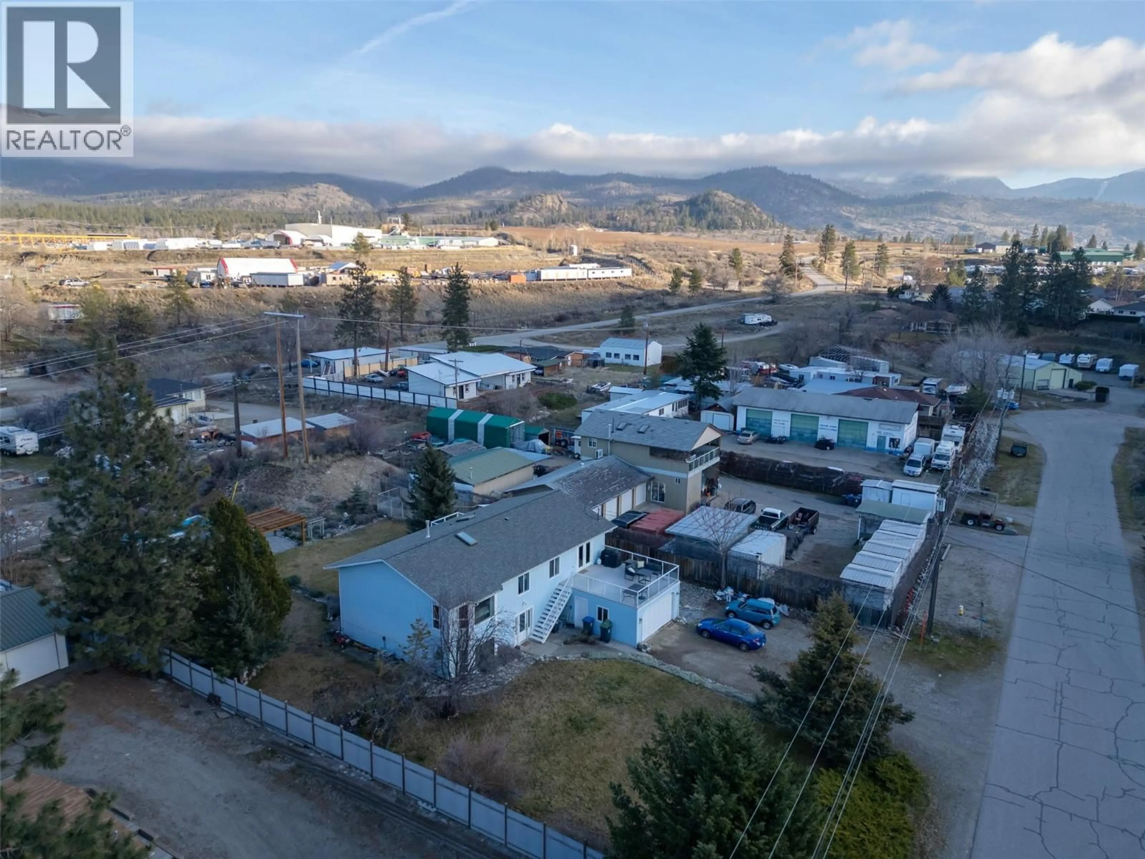 A pic from outside/outdoor area/front of a property/back of a property/a pic from drone, mountain view for 1721 WALLIS ROAD, Okanagan Falls British Columbia V0H1R2