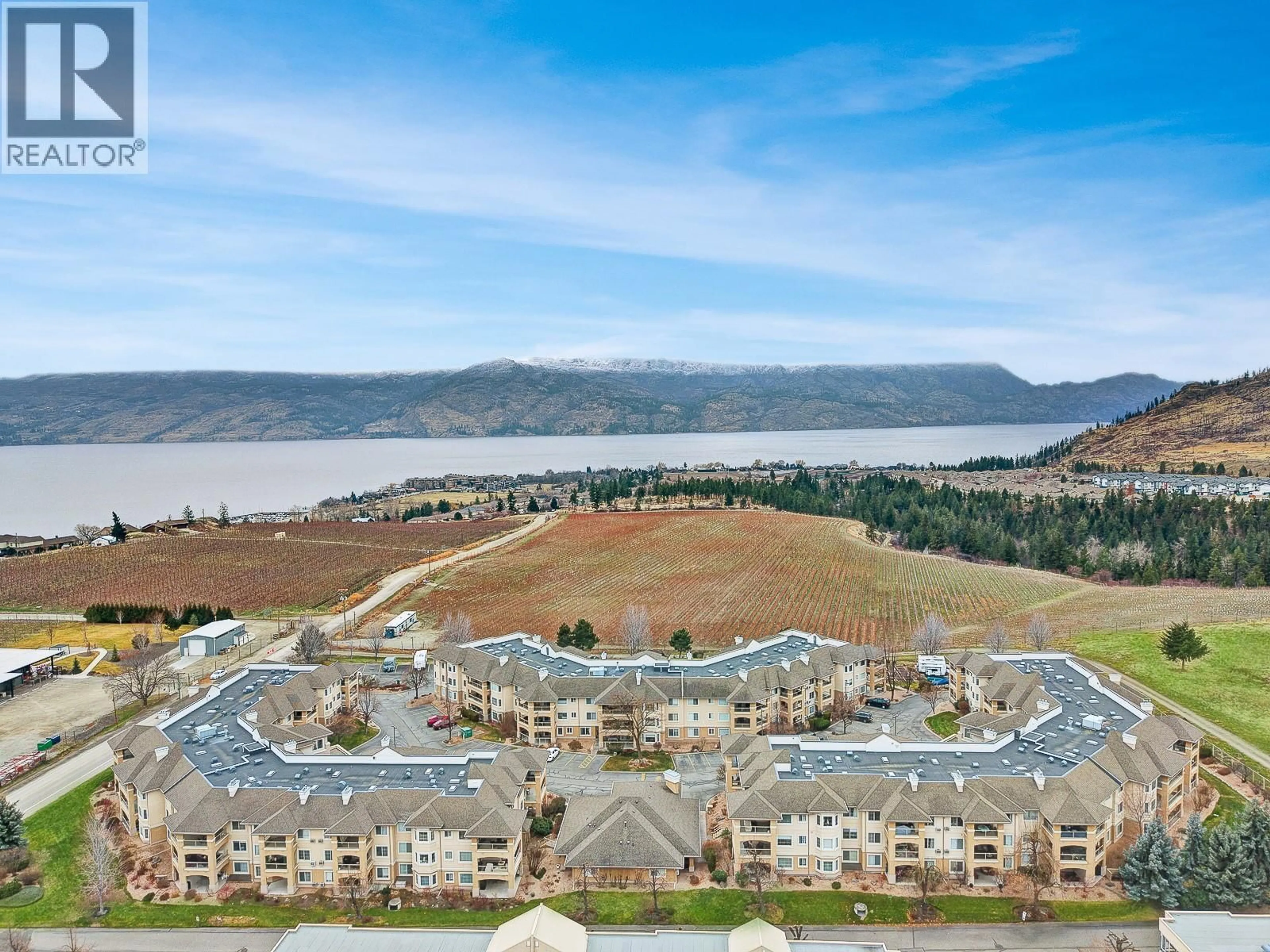 A pic from outside/outdoor area/front of a property/back of a property/a pic from drone, water/lake/river/ocean view for 301 - 3870 BROWN ROAD, West Kelowna British Columbia V4T2J5
