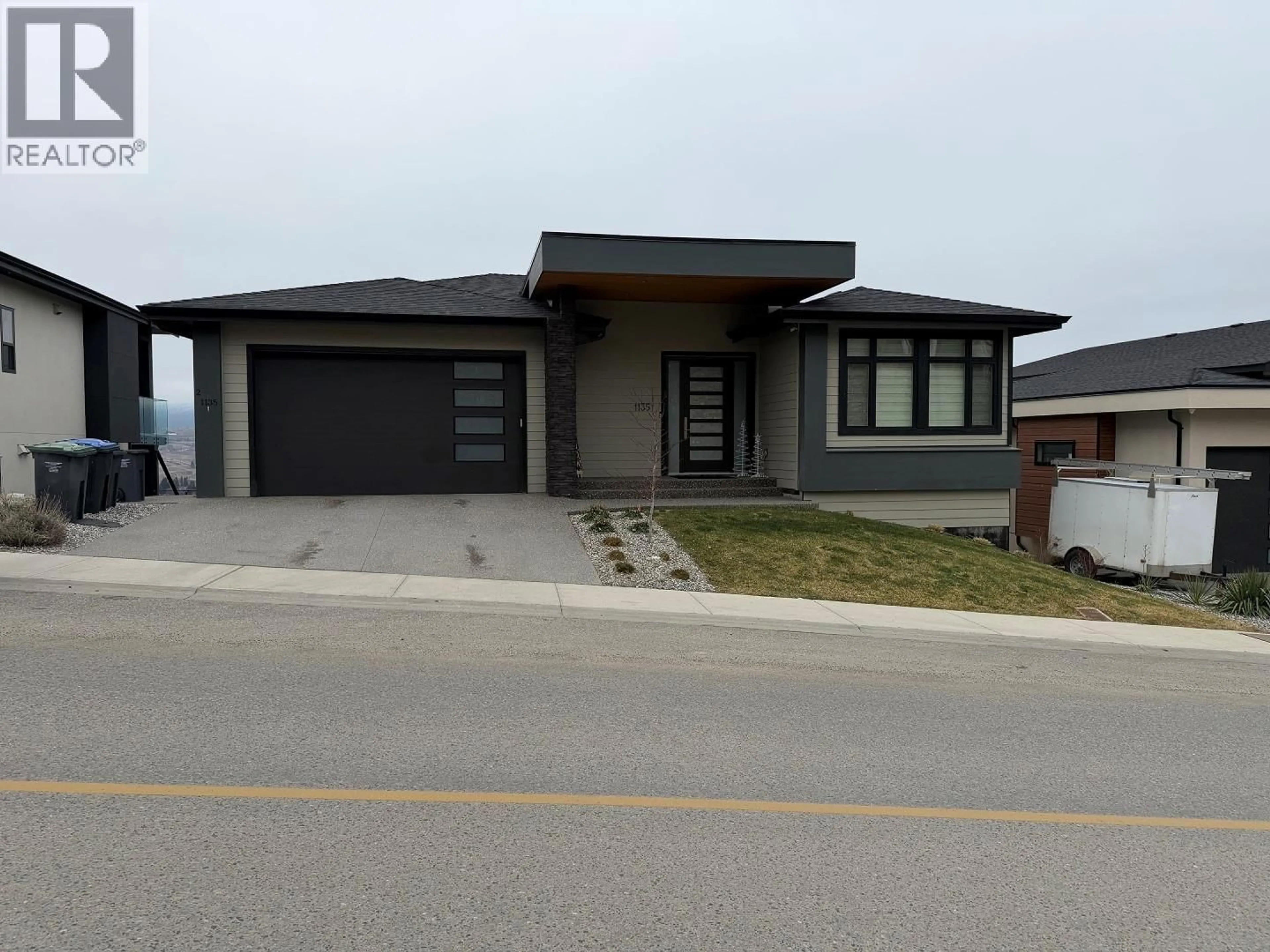 Home with brick exterior material, street for 1135 LOSETH DRIVE, Kelowna British Columbia V1P1S5