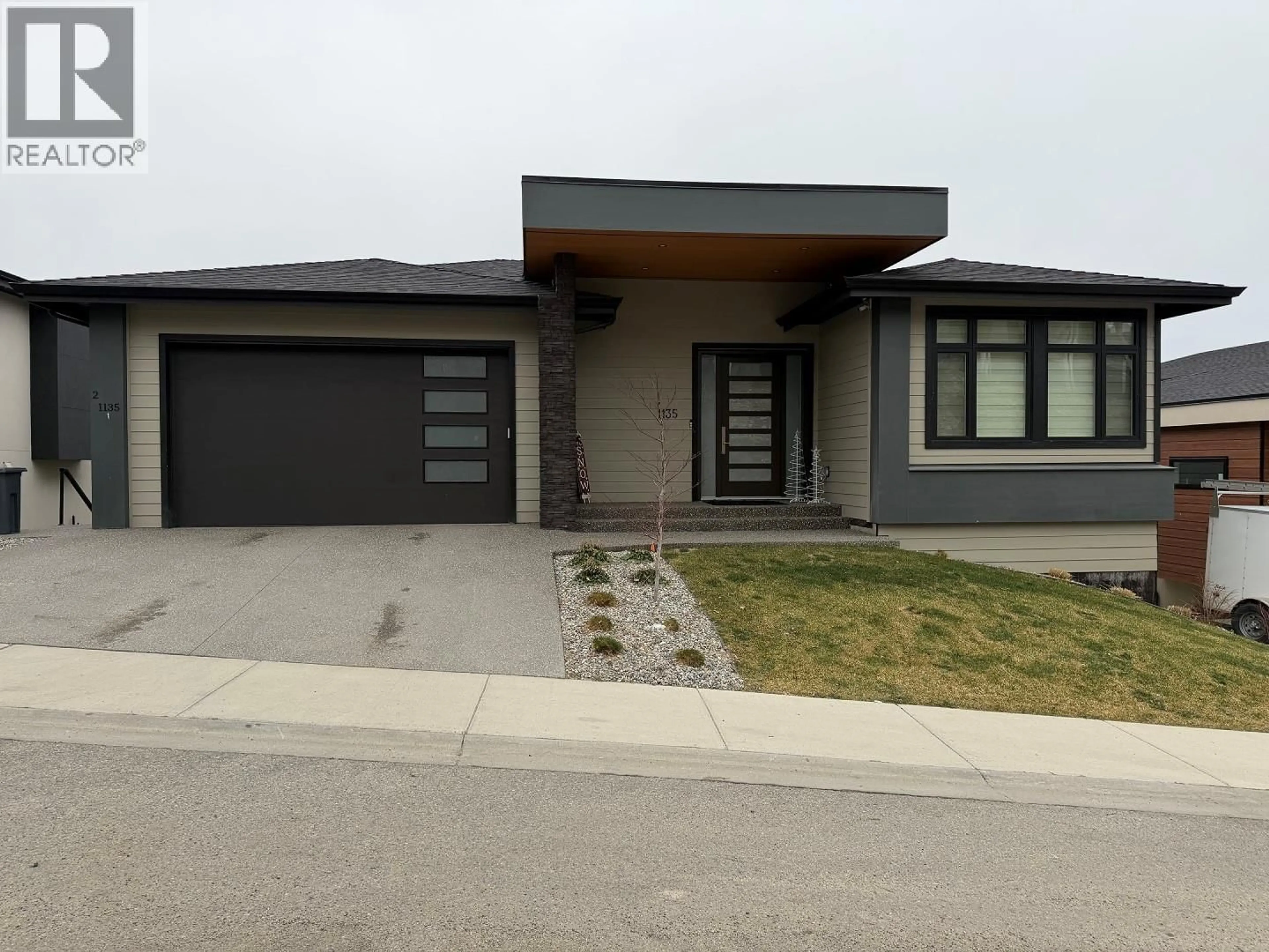 Home with brick exterior material, street for 1135 LOSETH DRIVE, Kelowna British Columbia V1P1S5