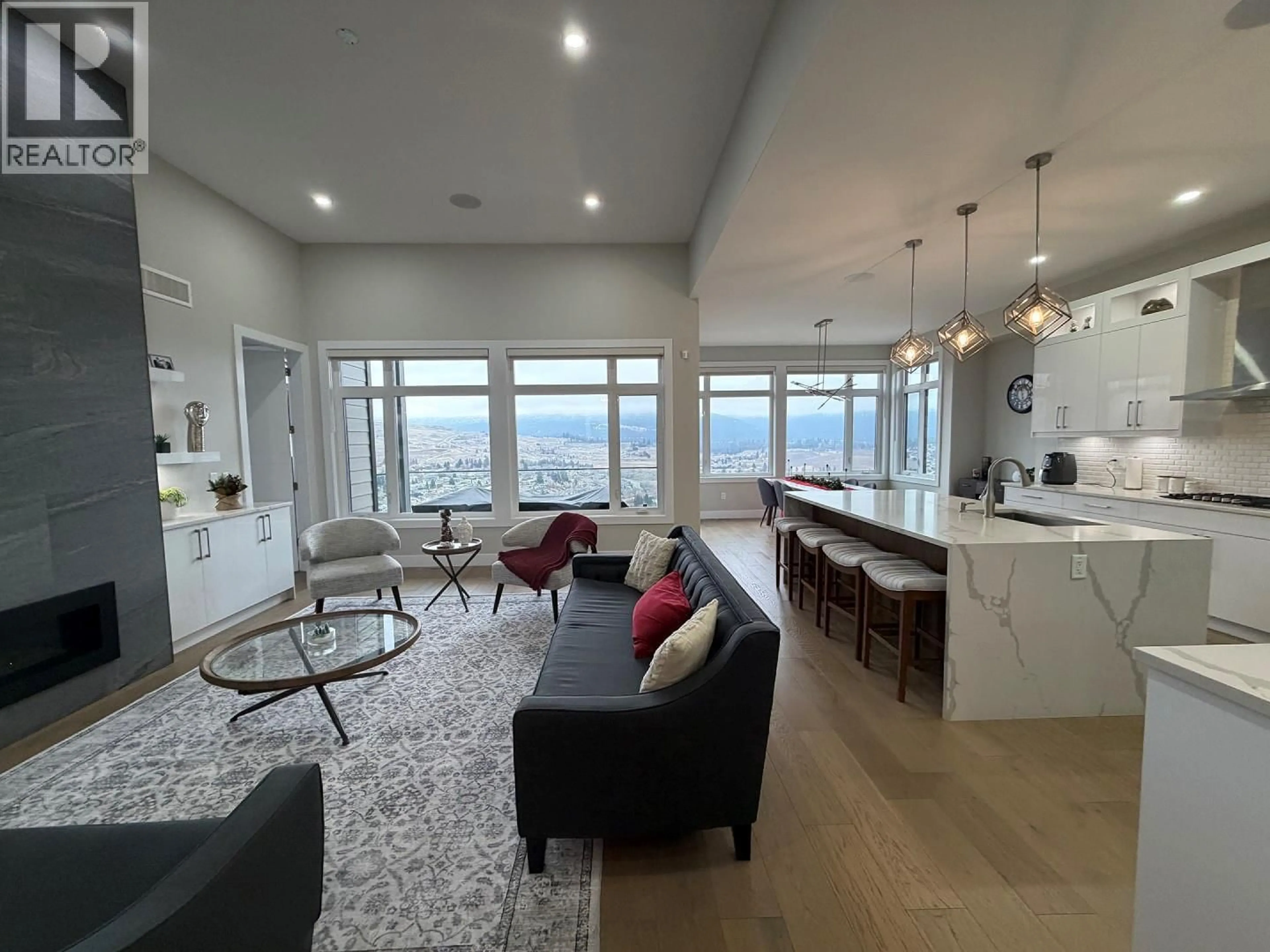 Living room with furniture, unknown for 1135 LOSETH DRIVE, Kelowna British Columbia V1P1S5