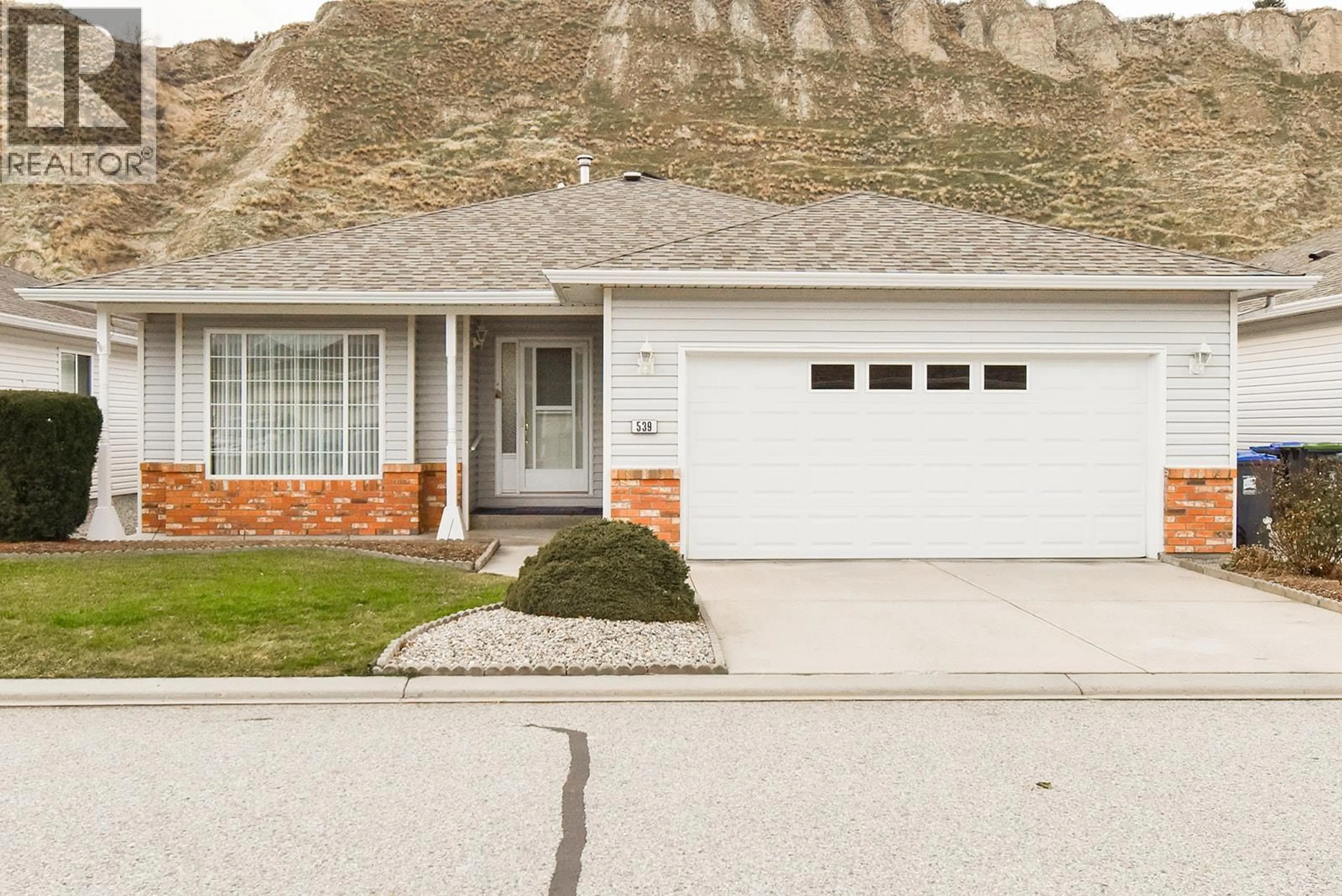 Home with vinyl exterior material, mountain view for 539 RED WING DRIVE, Penticton British Columbia V2A8N7