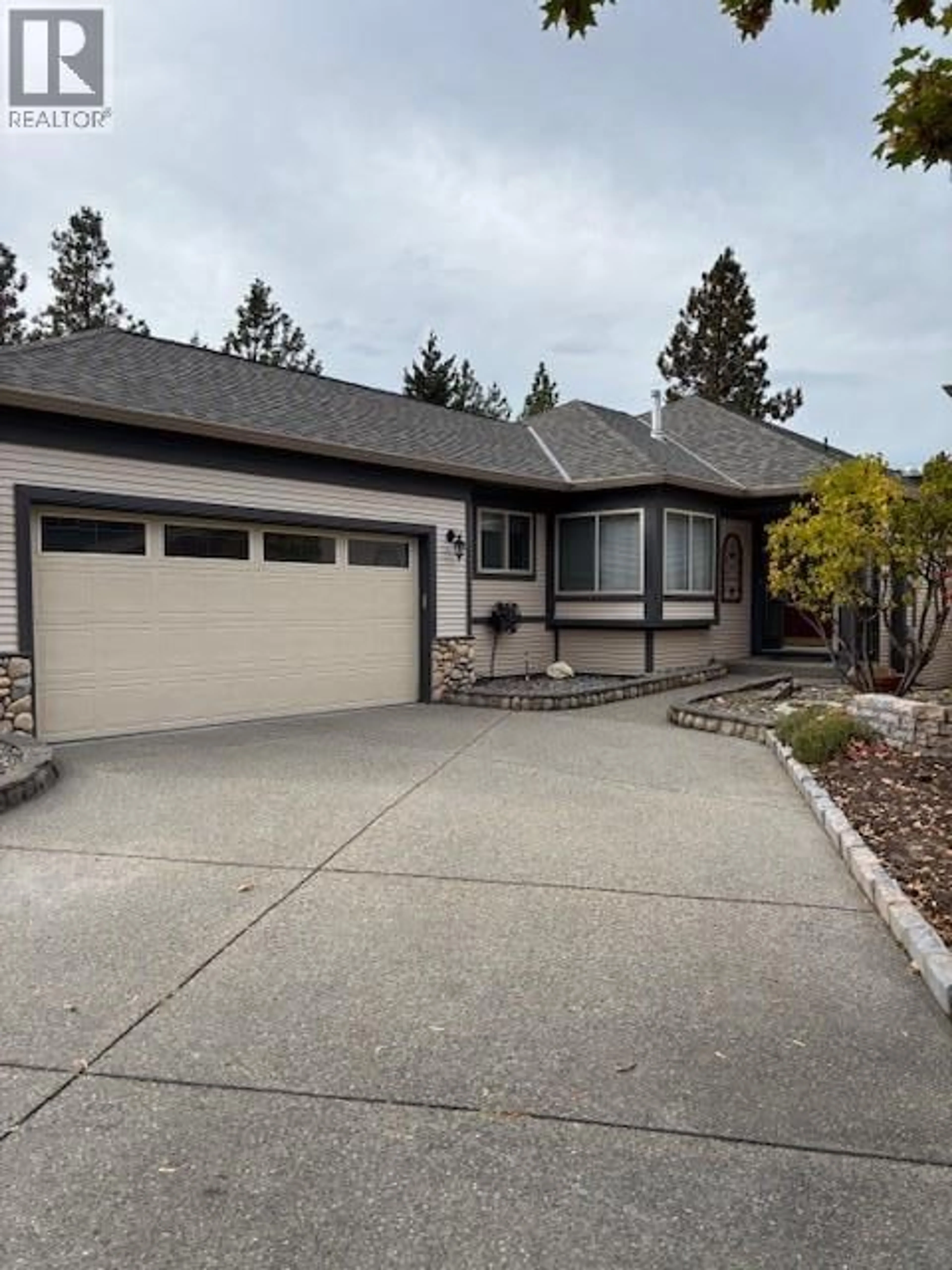 Home with vinyl exterior material, street for 134 - 4074 GELLATLY ROAD, West Kelowna British Columbia V4T2S8