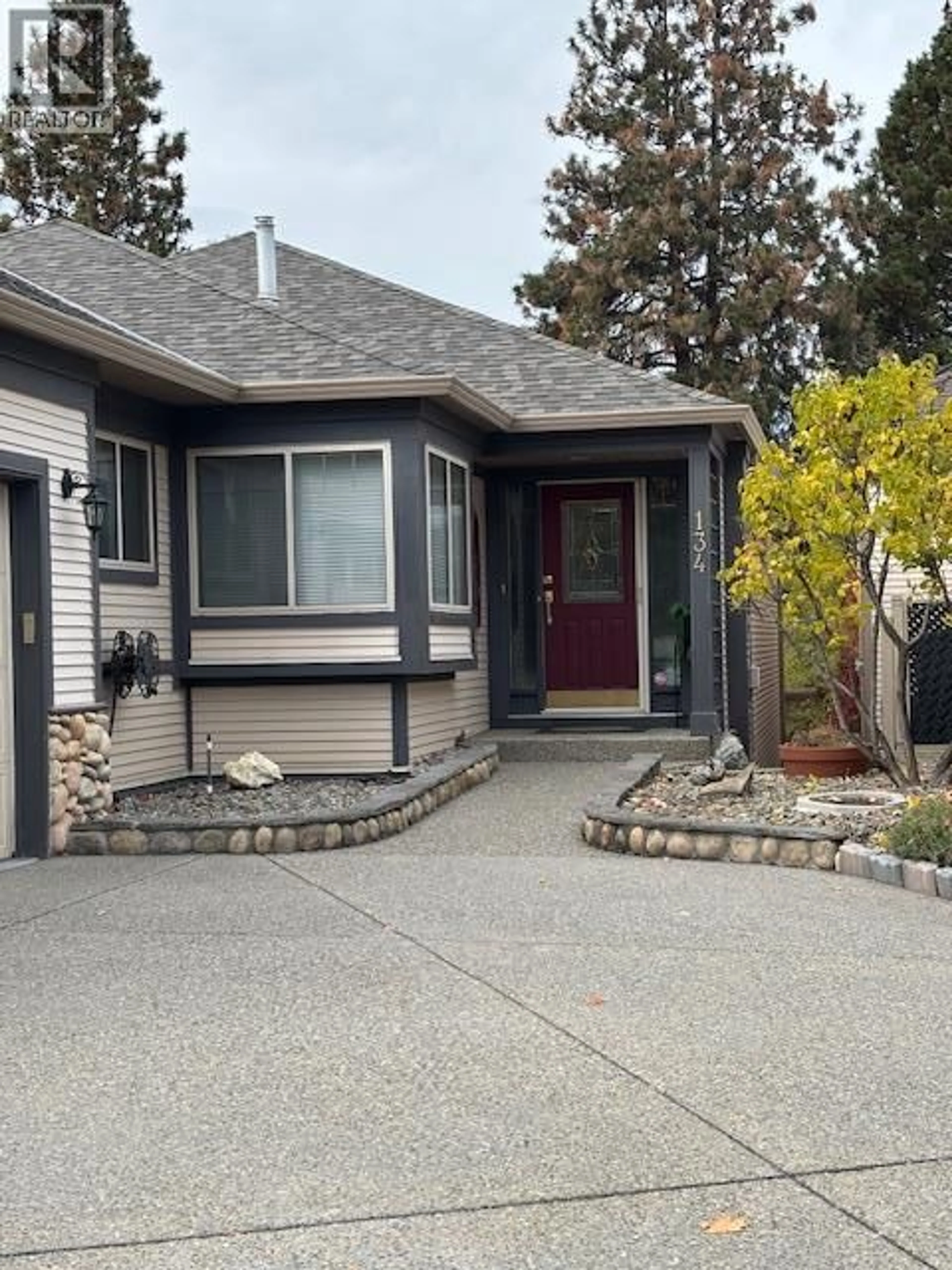Home with vinyl exterior material, street for 134 - 4074 GELLATLY ROAD, West Kelowna British Columbia V4T2S8