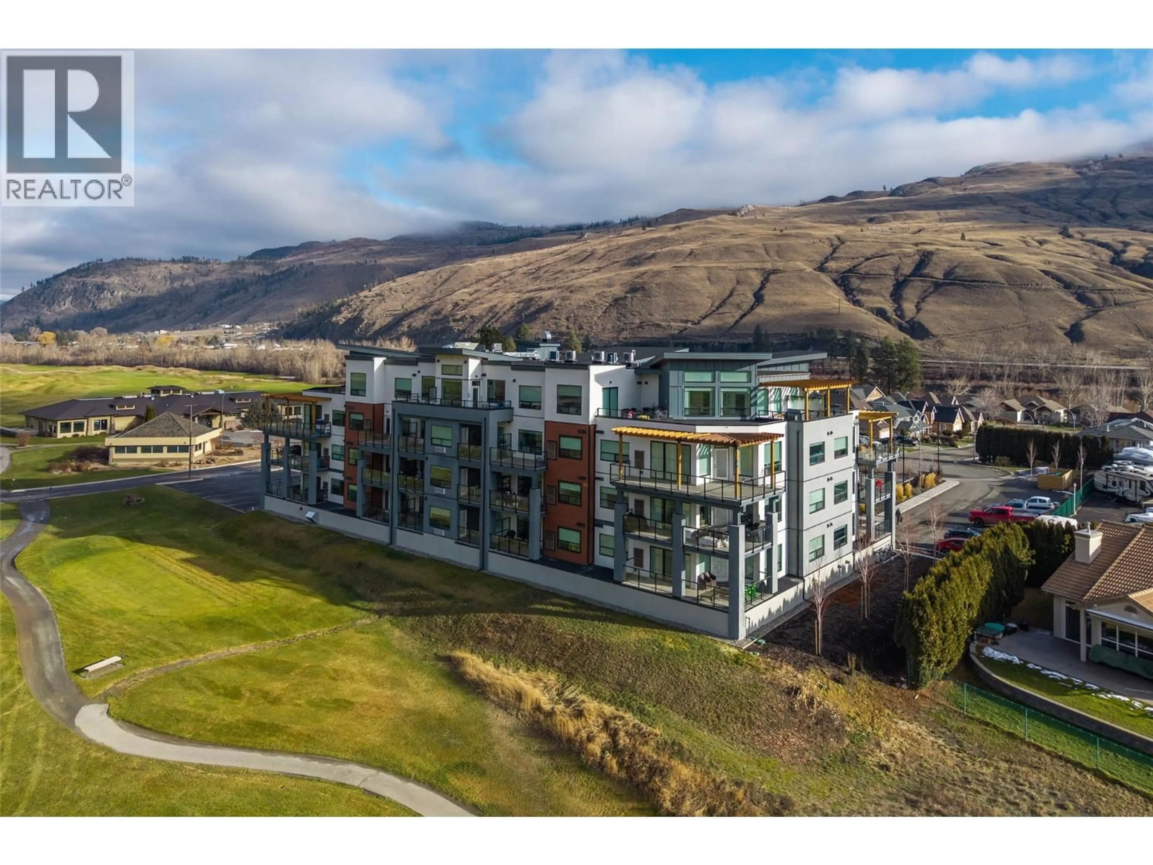 A pic from outside/outdoor area/front of a property/back of a property/a pic from drone, mountain view for 108 - 651 DUNES DRIVE, Kamloops British Columbia V2B0K2