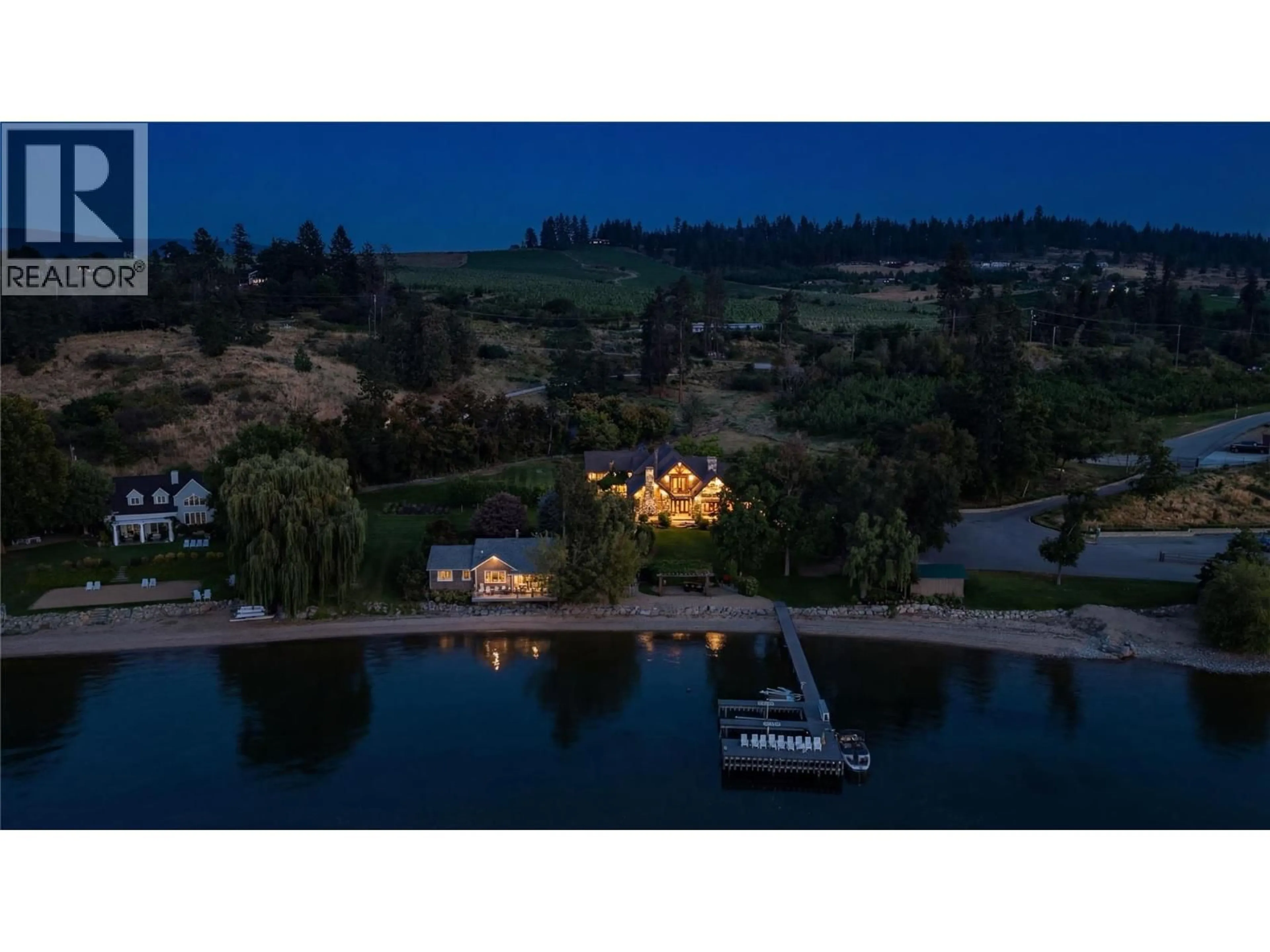 A pic from outside/outdoor area/front of a property/back of a property/a pic from drone, water/lake/river/ocean view for 12056 OKANAGAN CENTRE ROAD WEST, Lake Country British Columbia V4V2H5
