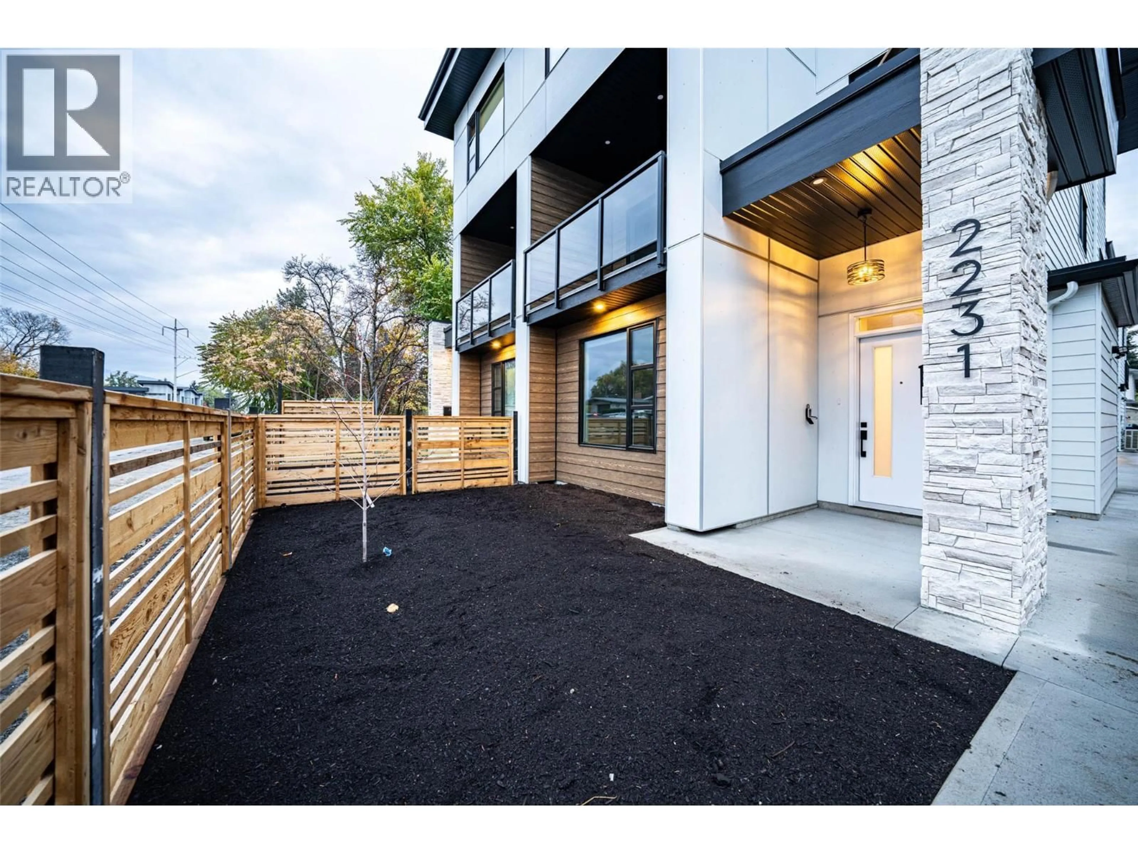 Home with brick exterior material, street for 2231 RICHTER STREET, Kelowna British Columbia V1Y2N9