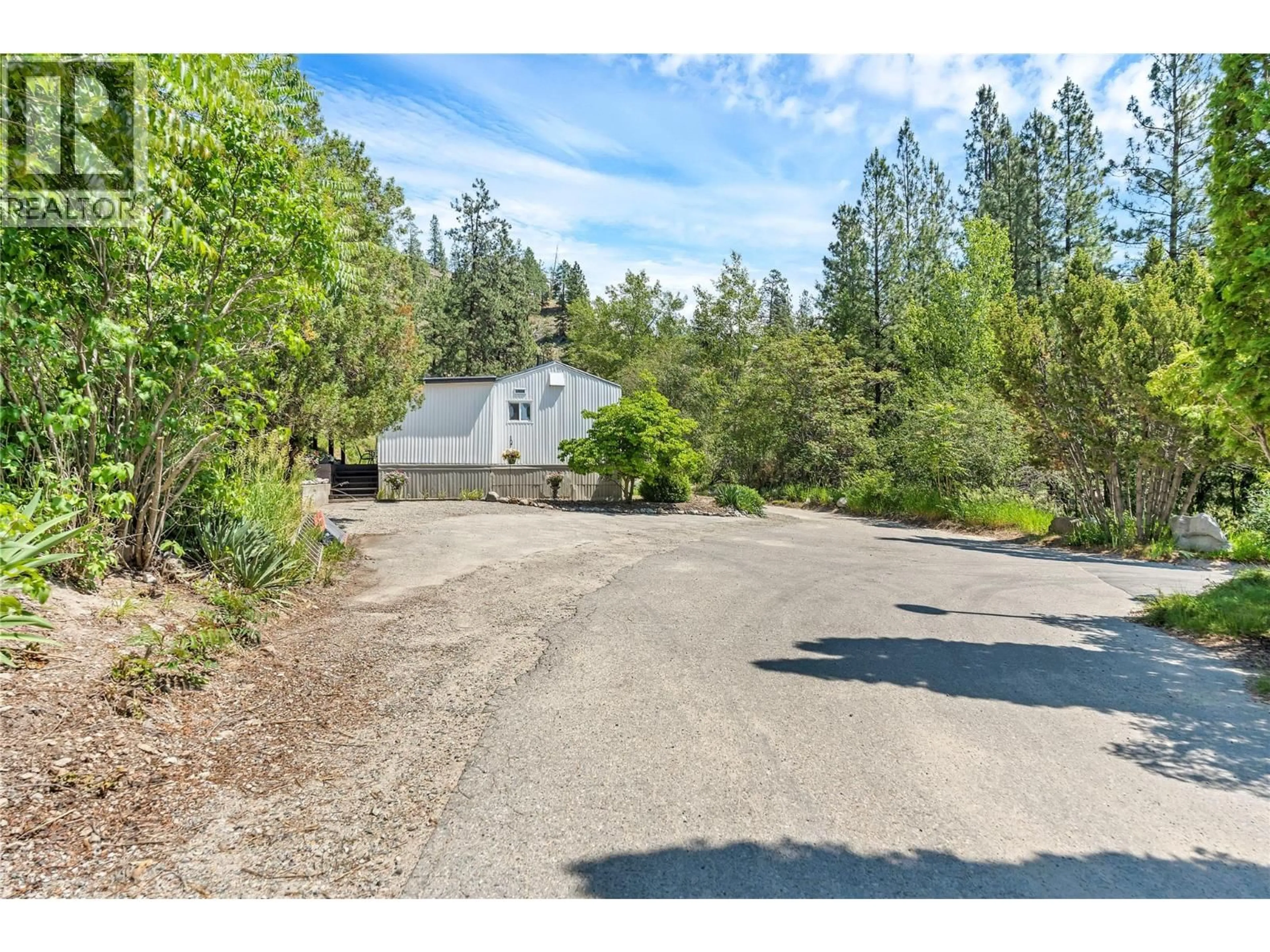 A pic from outside/outdoor area/front of a property/back of a property/a pic from drone, unknown for 305 - 1701 PENTICTON AVENUE, Penticton British Columbia V2A2N5