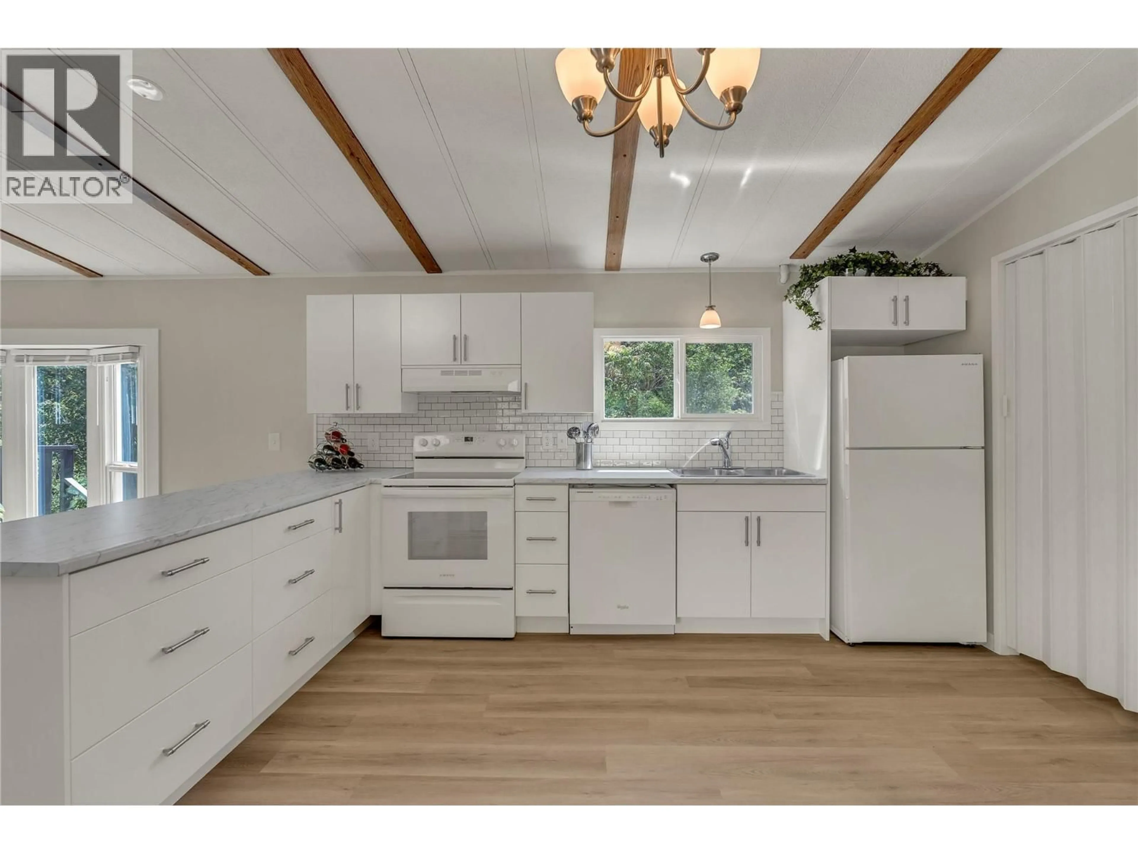 Open concept kitchen, unknown for 305 - 1701 PENTICTON AVENUE, Penticton British Columbia V2A2N5